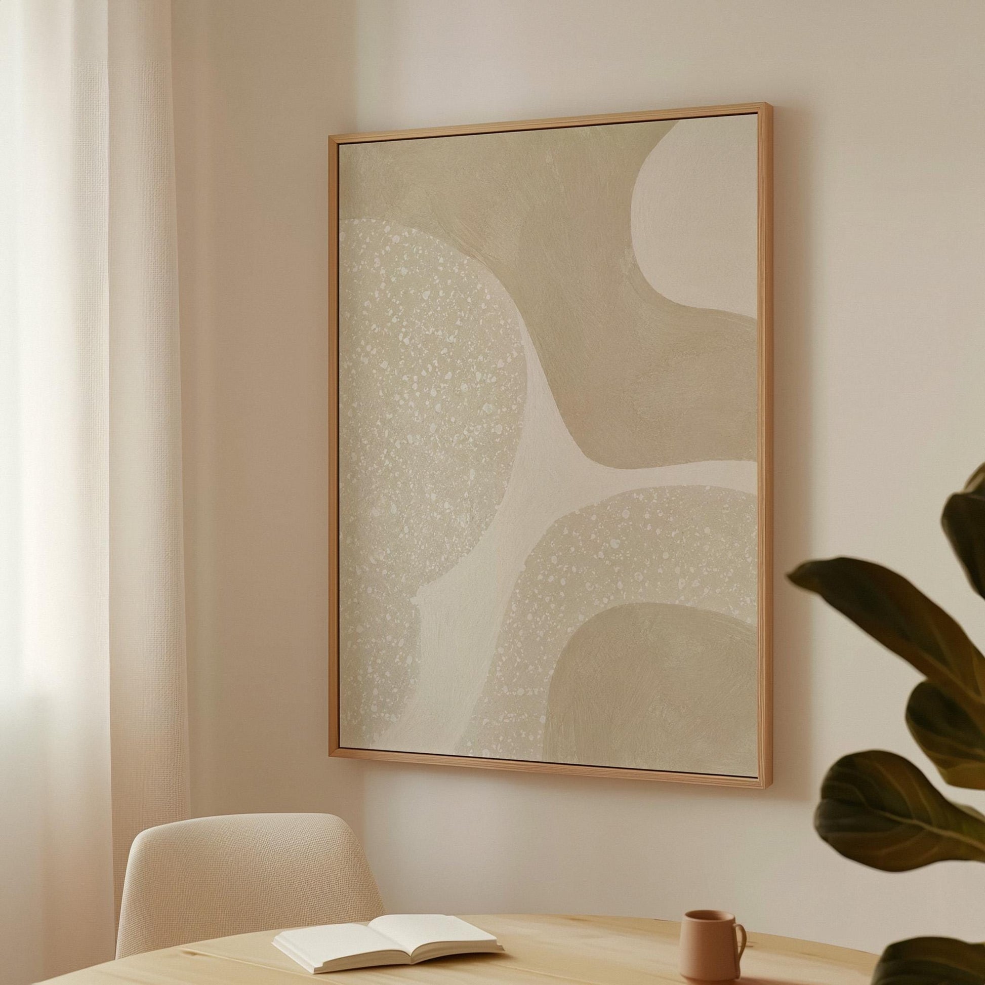 Soft speckled organic shapes in pearl and cream, canvas wall art hanging in a calm, modern living space