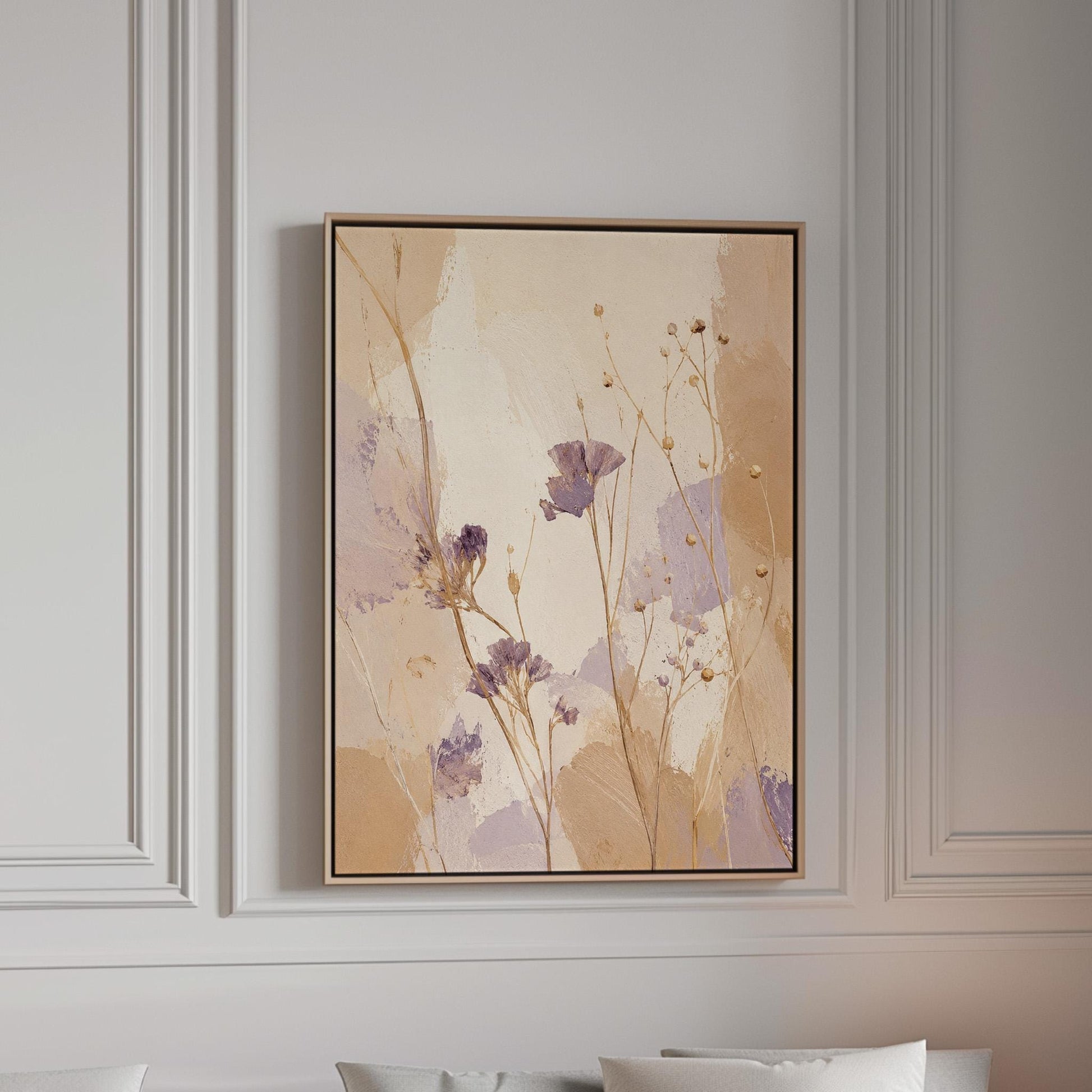 Delicate wildflowers and lavender stems on warm beige, canvas print in a bright room with natural daylight