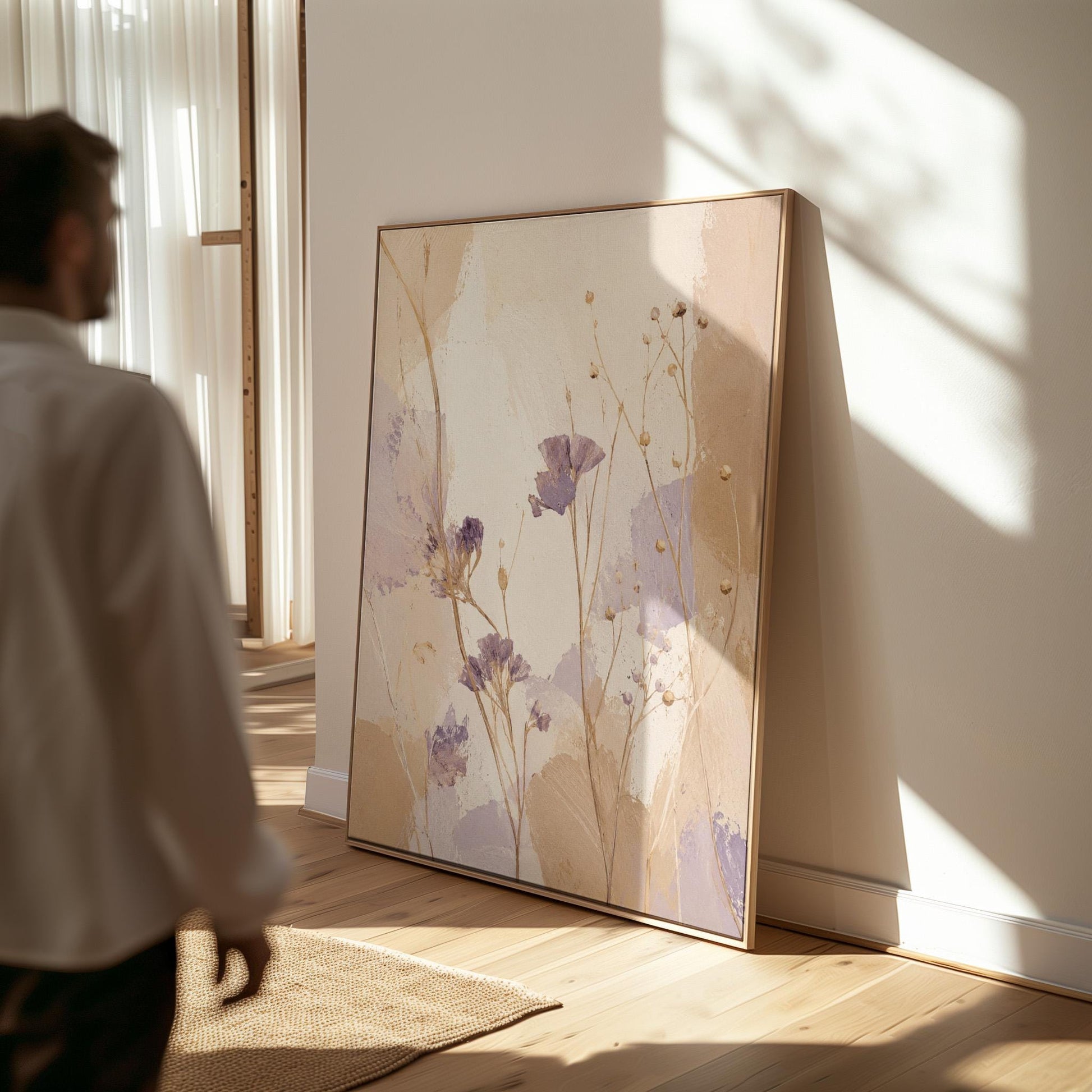 Delicate wildflowers and lavender stems on warm beige, canvas print shown to scale in a furnished room