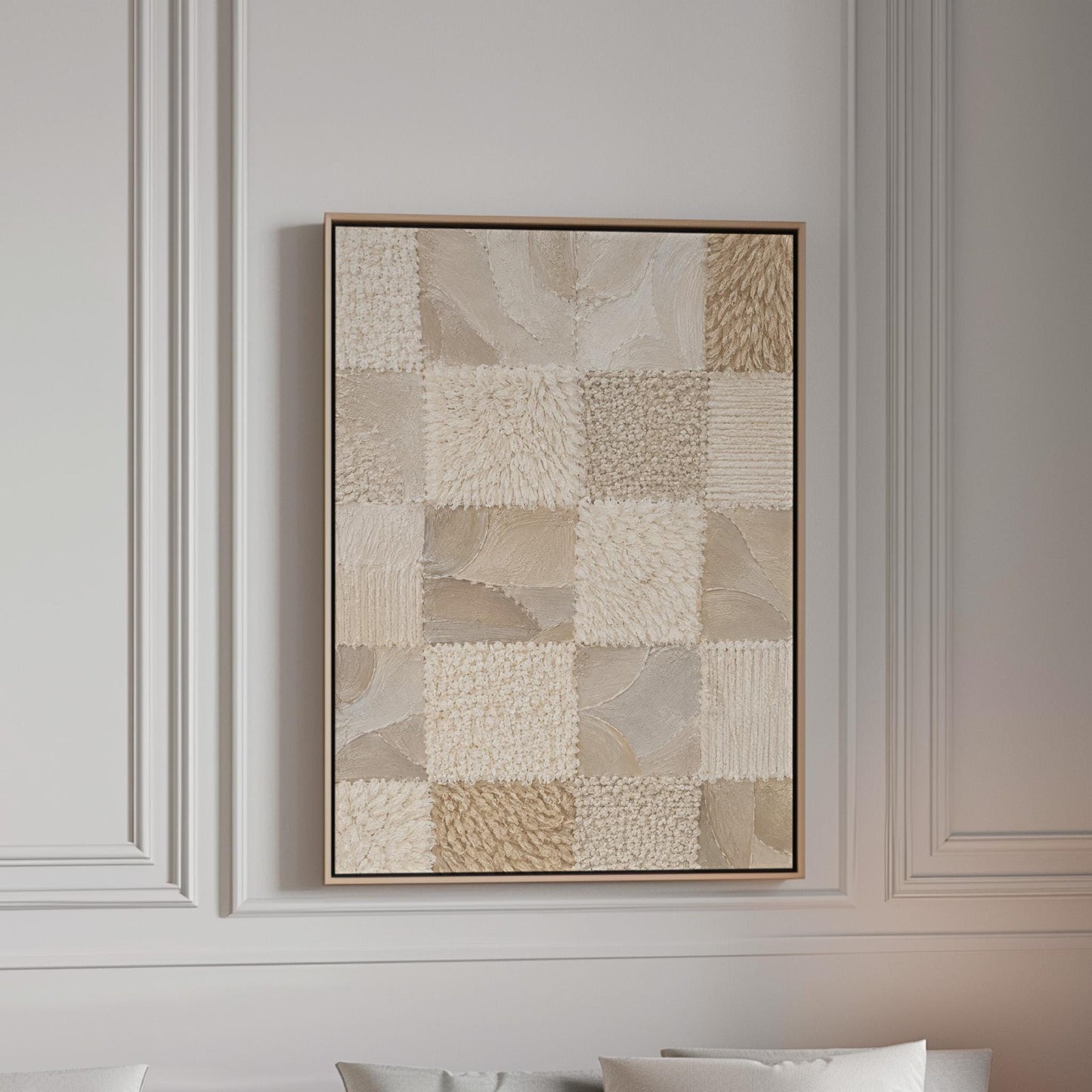 Checkered patchwork of soft cream and beige squares, canvas print in a bright room with natural daylight