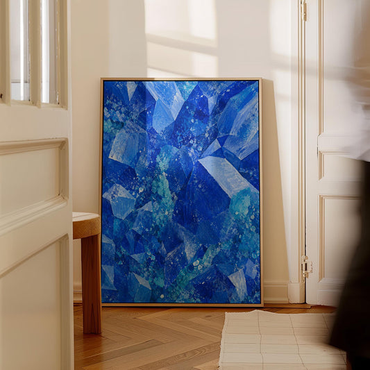Faceted sapphire crystal planes with turquoise sparks, canvas print hanging in a calm, modern living space