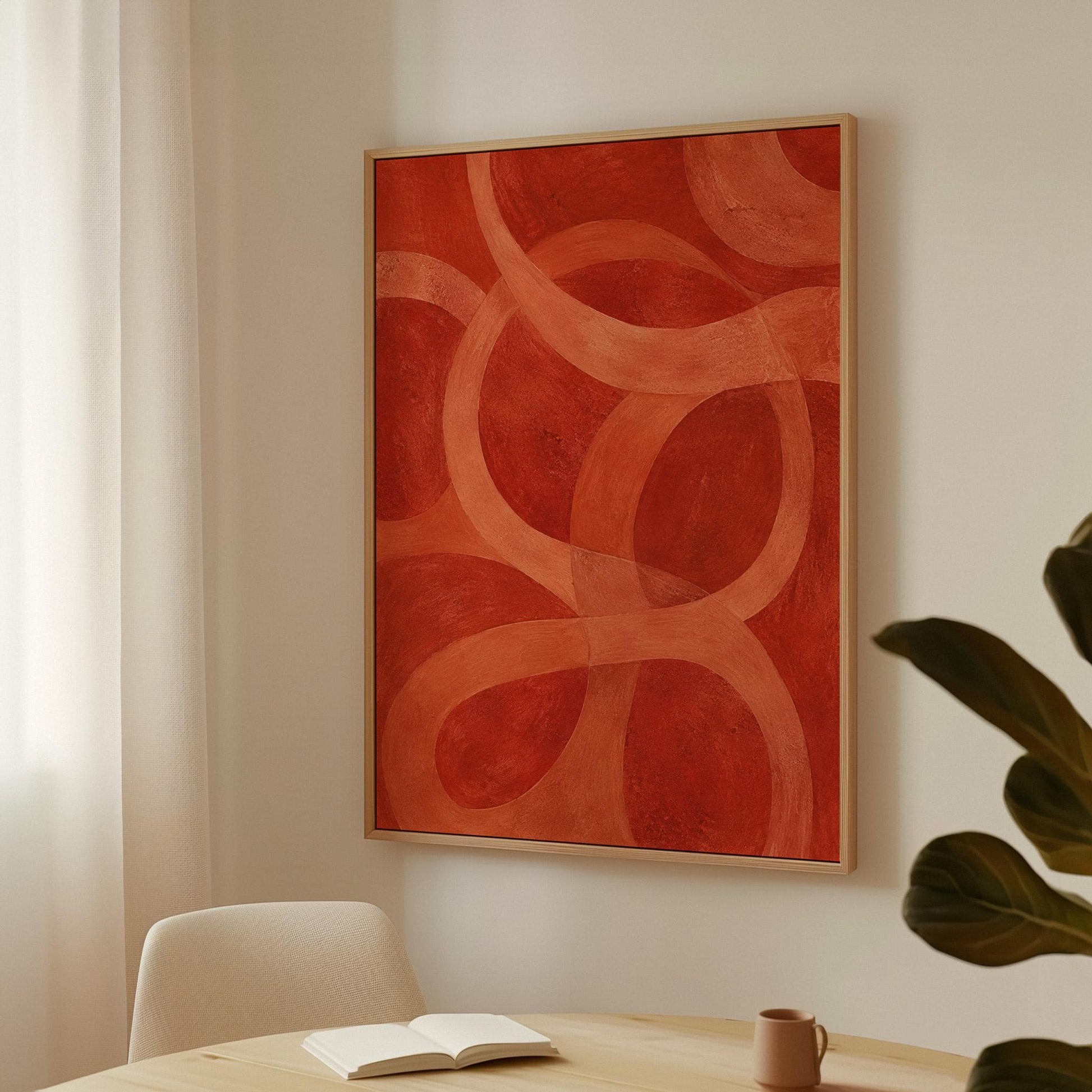Interlocking loop rings in burnt orange and rust, canvas wall art styled against a soft white wall