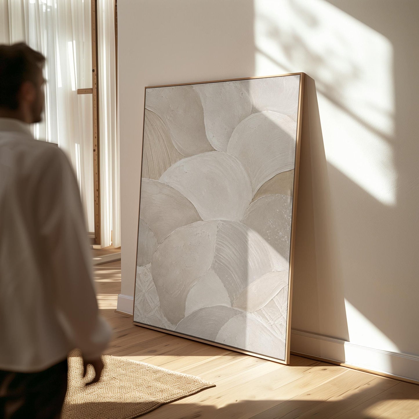 Sweeping layered petal curves in cream tones, canvas print displayed on a neutral wall in a styled interior