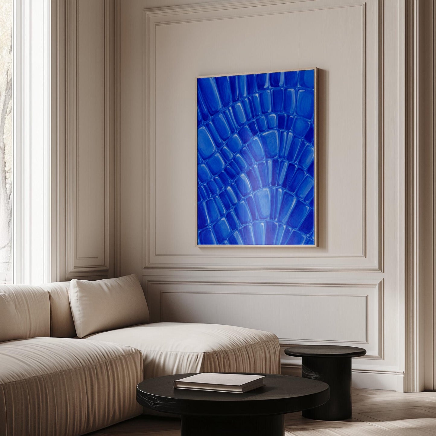 Fan arcs of cobalt mosaic pebbles, canvas print presented in a light, minimal room