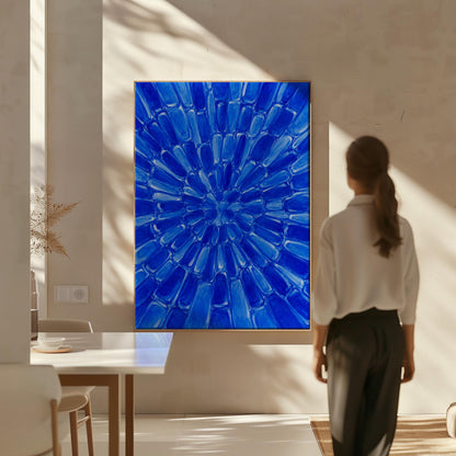 Radial starburst rays in electric cobalt blue, canvas print presented in a light, minimal room
