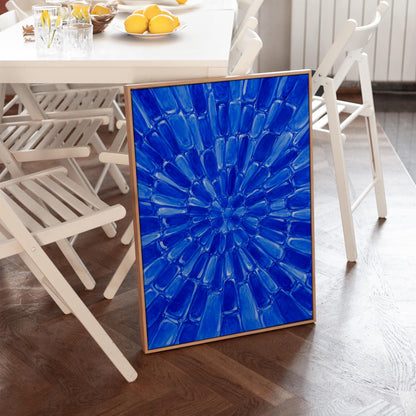 Radial starburst rays in electric cobalt blue, canvas wall art styled against a soft white wall