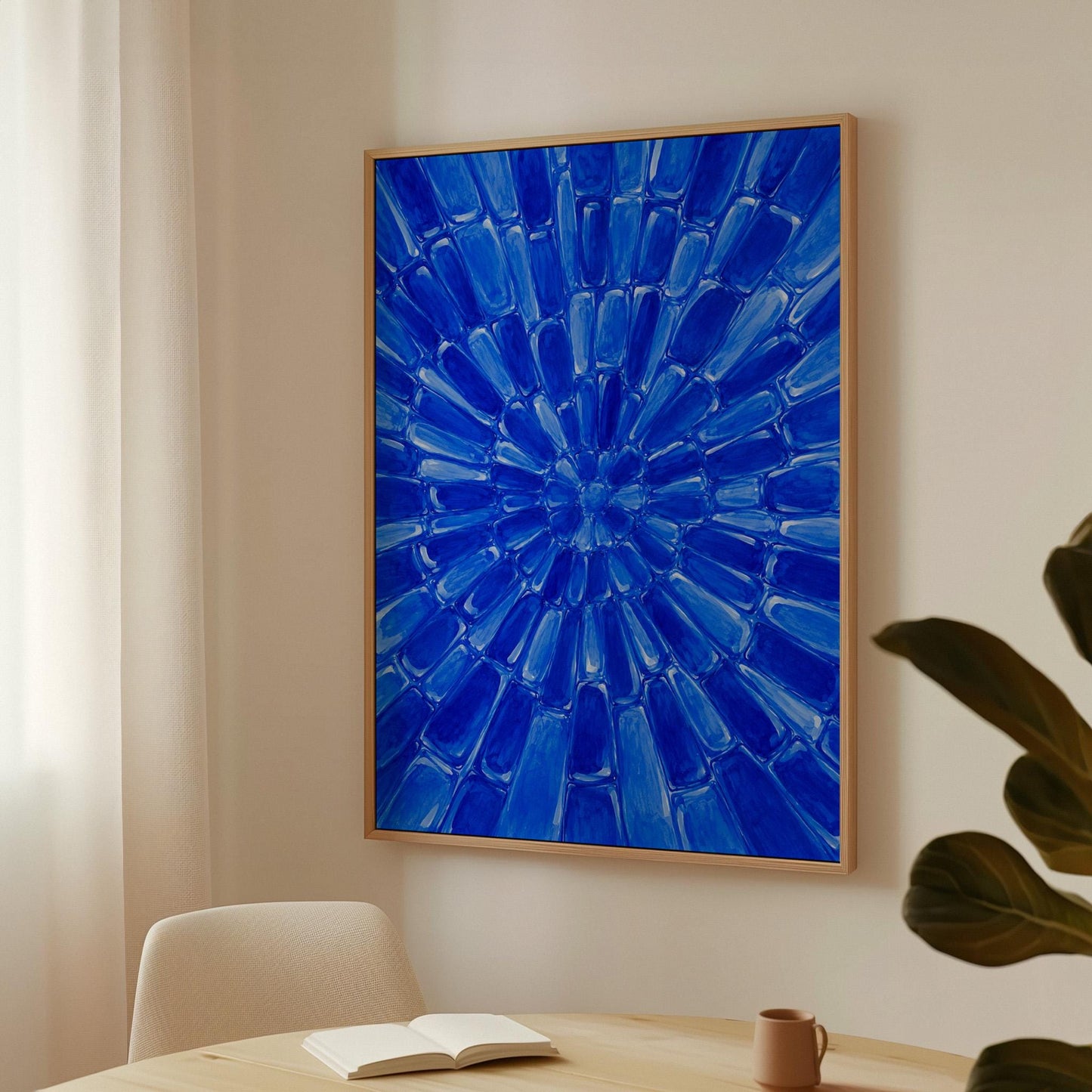 Radial starburst rays in electric cobalt blue, canvas wall art on a quiet wall in a considered interior