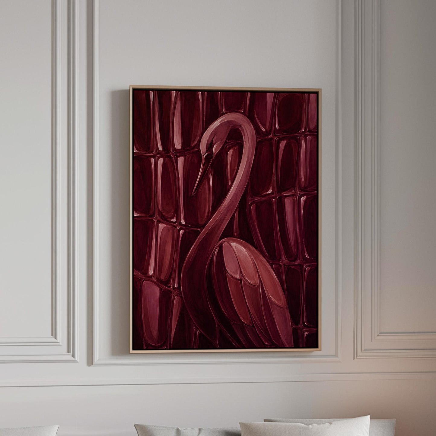 Flamingo silhouette emerging from deep burgundy, canvas print in a bright room with natural daylight