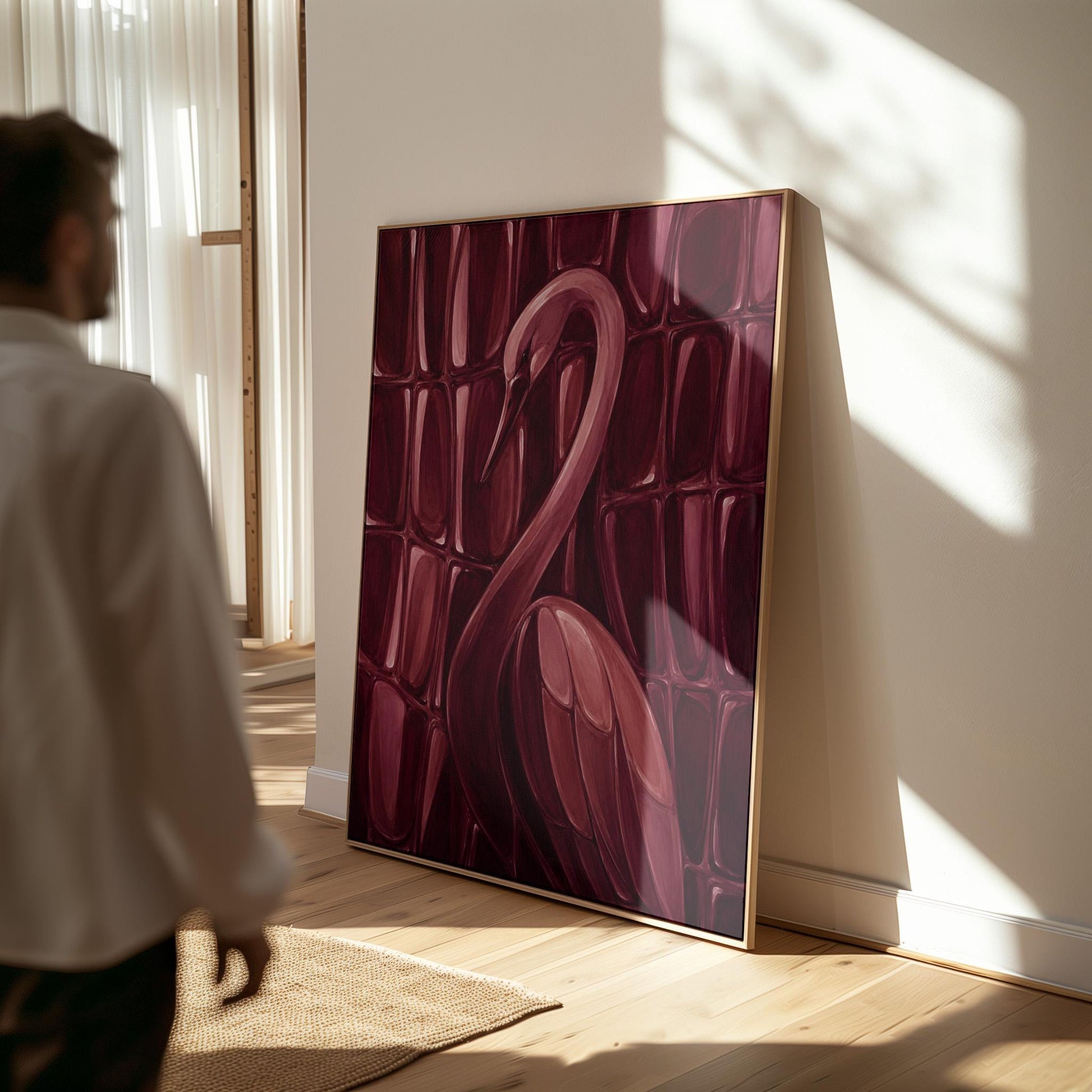 Flamingo silhouette emerging from deep burgundy, canvas print hanging in a calm, modern living space
