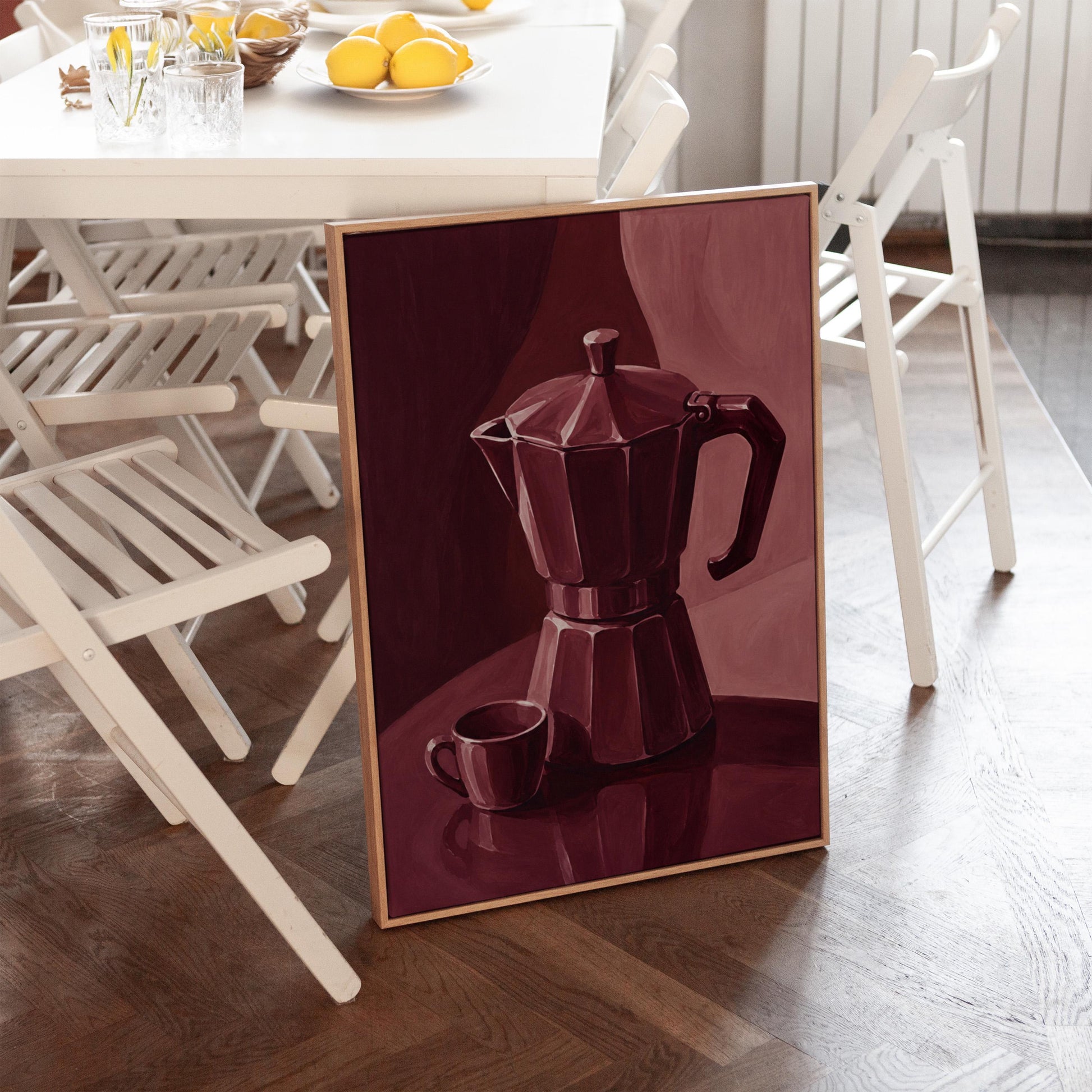 Moka pot and espresso cup still life in burgundy monochrome, canvas print seen in a warm interior with natural light