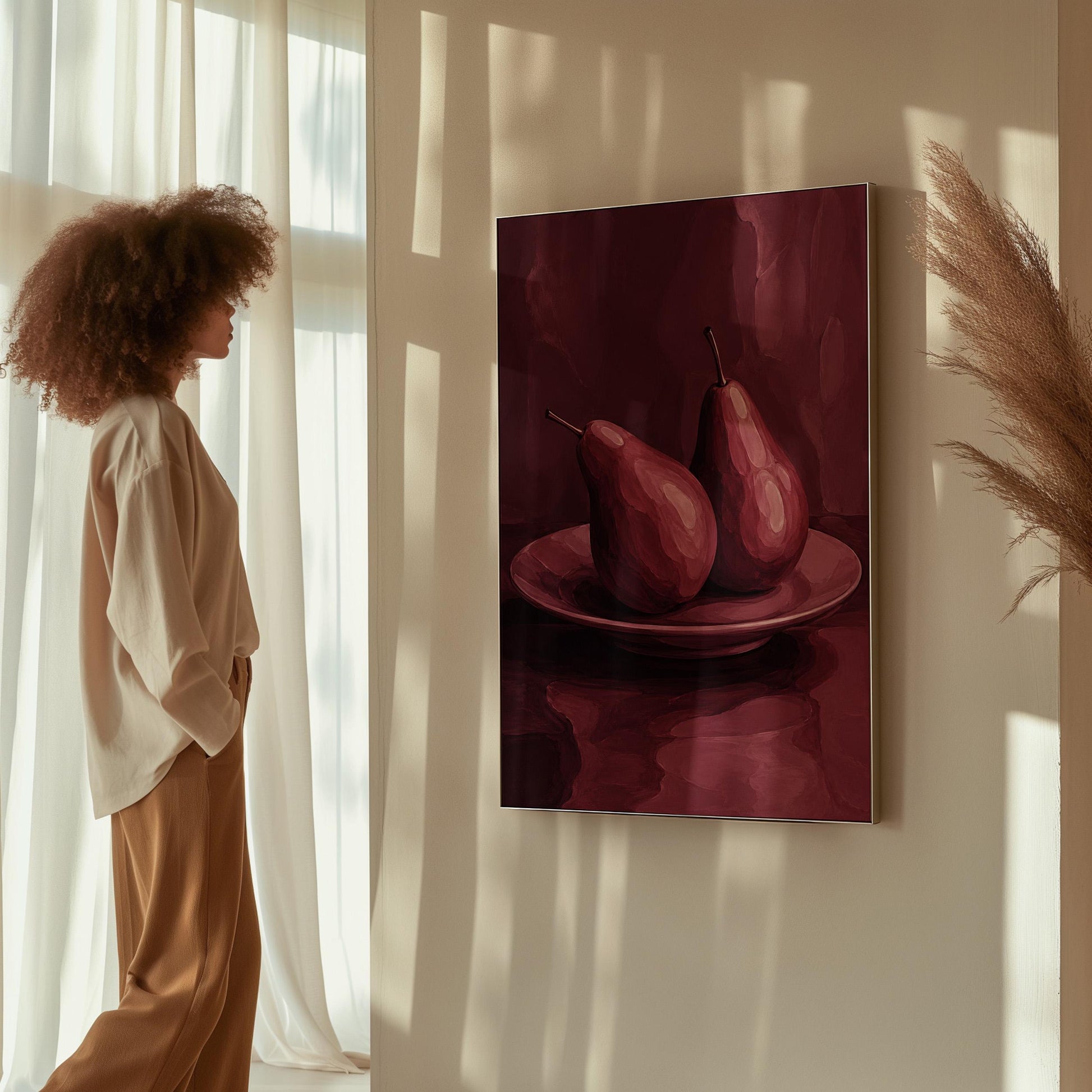 Two pears on a plate painted in burgundy monochrome, canvas wall art presented in a light, minimal room