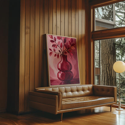 Curvy red vase with leafy branch in burgundy tones, canvas print shown in a sunlit, contemporary room