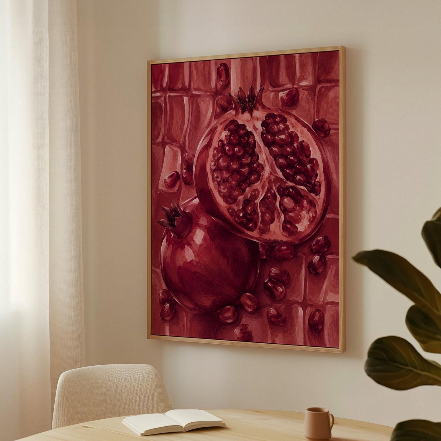 Open pomegranate with ruby seeds in burgundy tones, canvas wall art presented in a light, minimal room