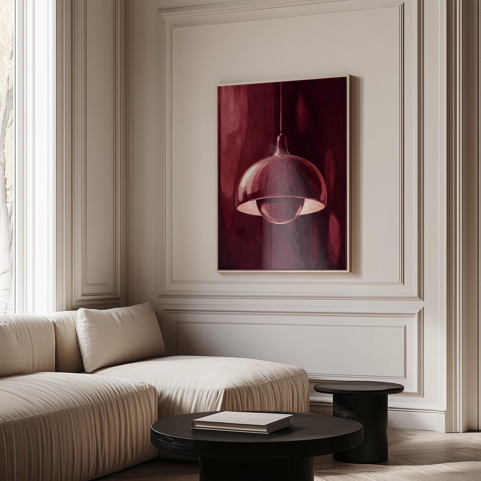 Pendant lamp glowing warmly against burgundy darkness, canvas print shown to scale in a furnished room