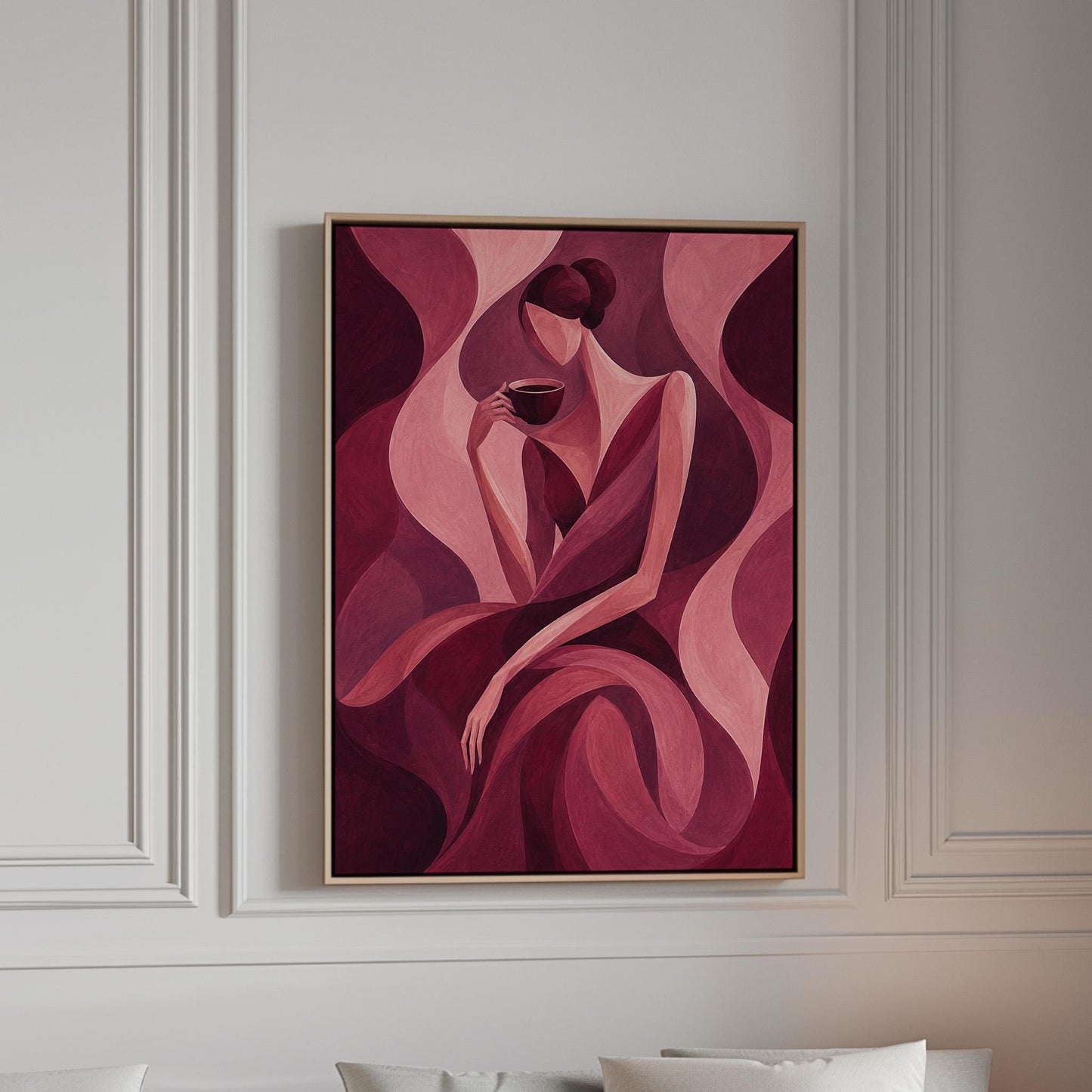 Woman sipping coffee among soft burgundy waves, canvas print in a bright room with natural daylight