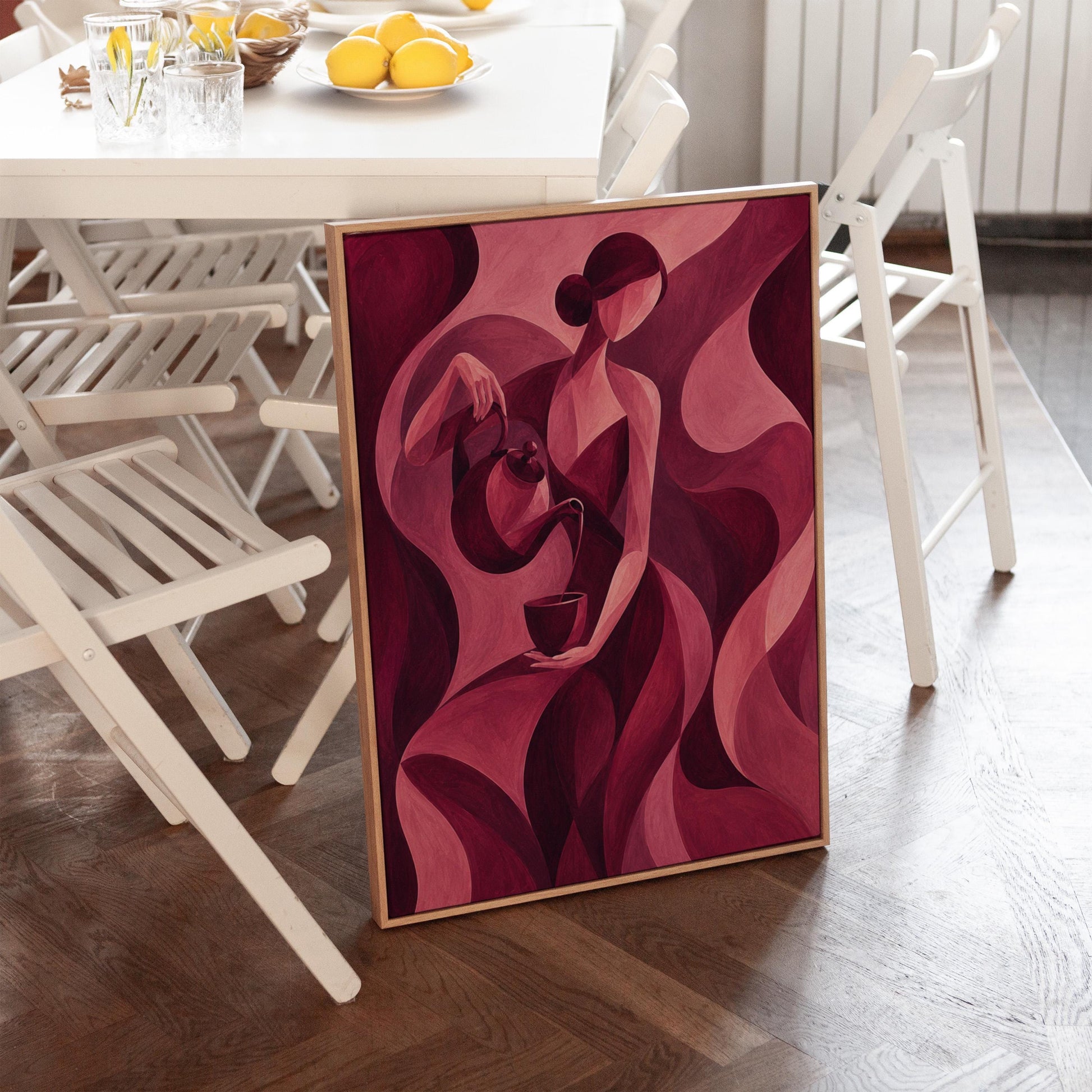 Woman pouring tea in flowing burgundy deco style, canvas print presented in a light, minimal room