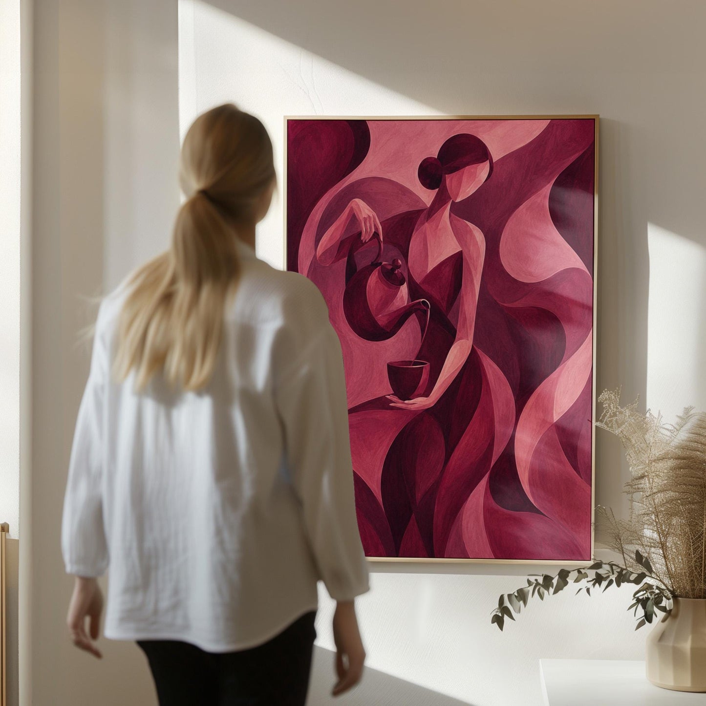 Woman pouring tea in flowing burgundy deco style, canvas wall art seen in a warm interior with natural light