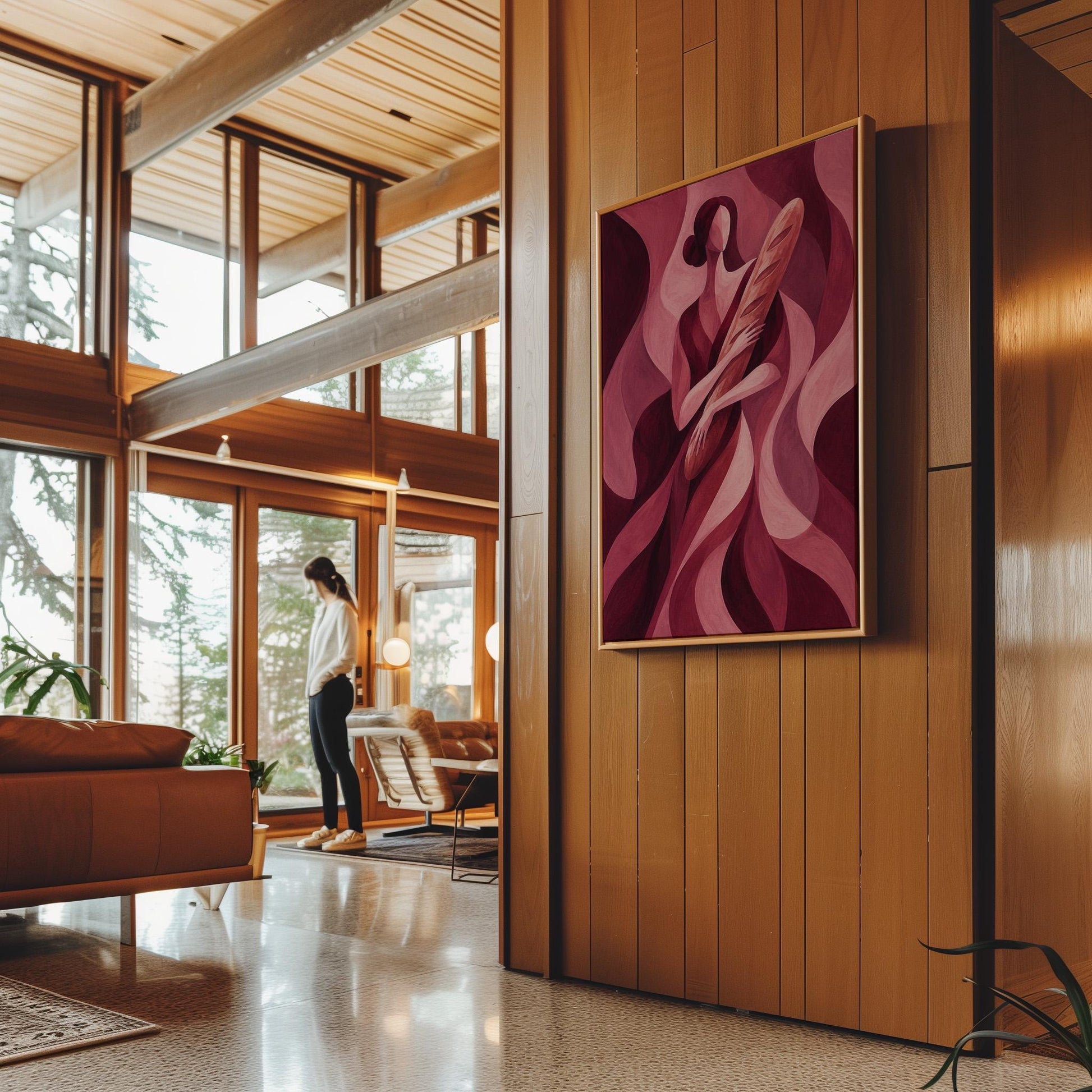 Woman holding baguette in burgundy deco style, canvas print hanging in a calm, modern living space