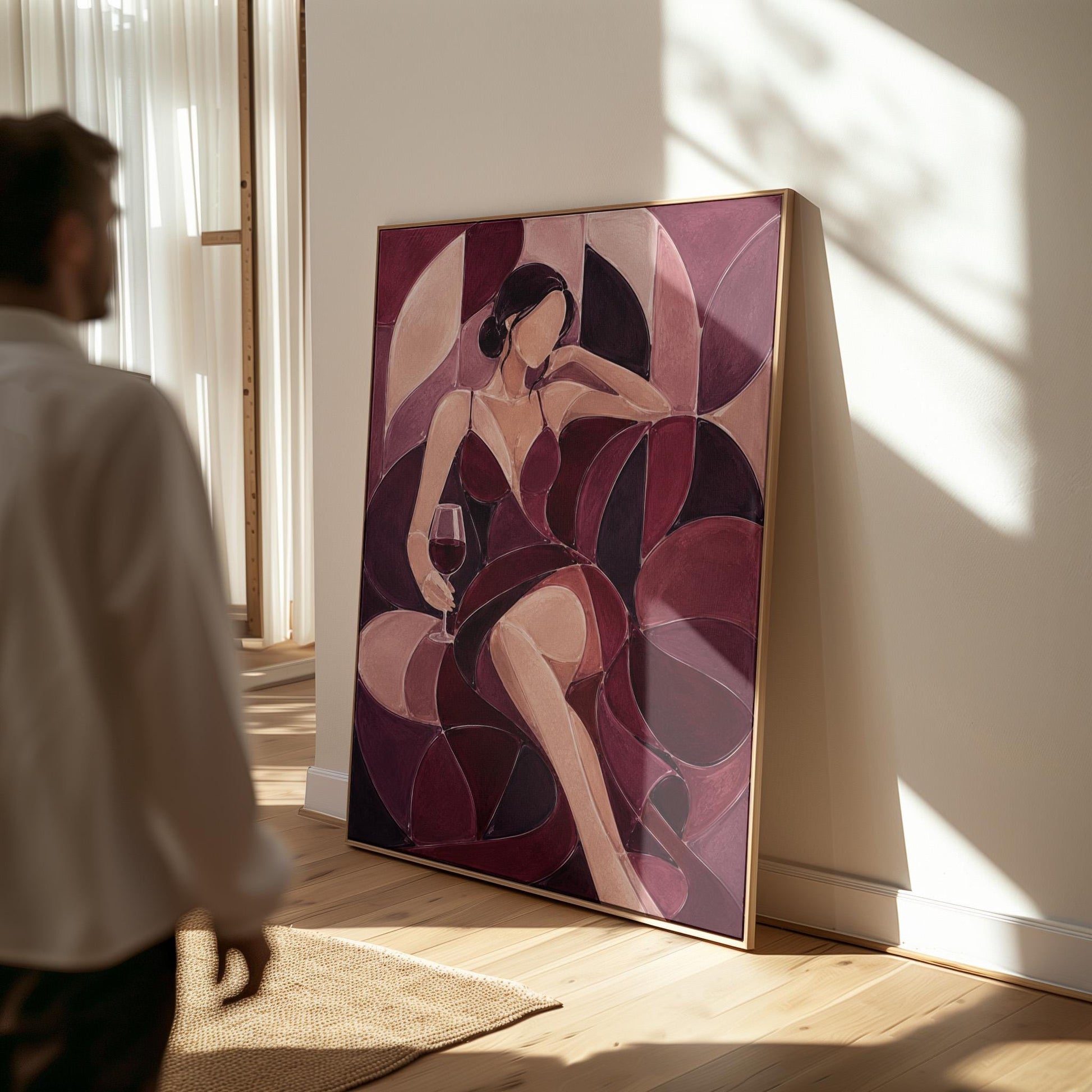 Woman lounging with wine glass in burgundy deco, canvas wall art seen in a warm interior with natural light