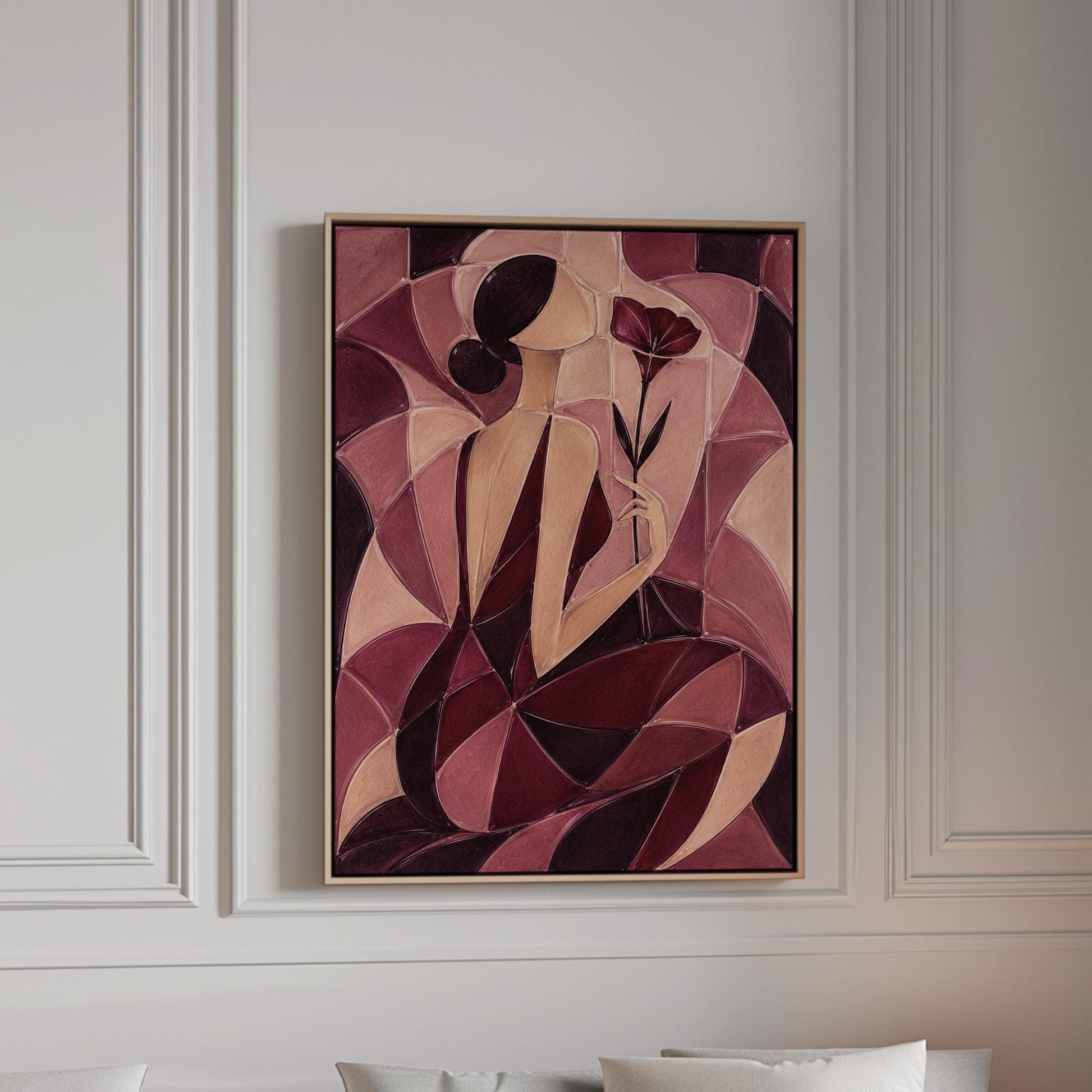 Woman holding poppies in cubist burgundy and cream, canvas print in a bright room with natural daylight