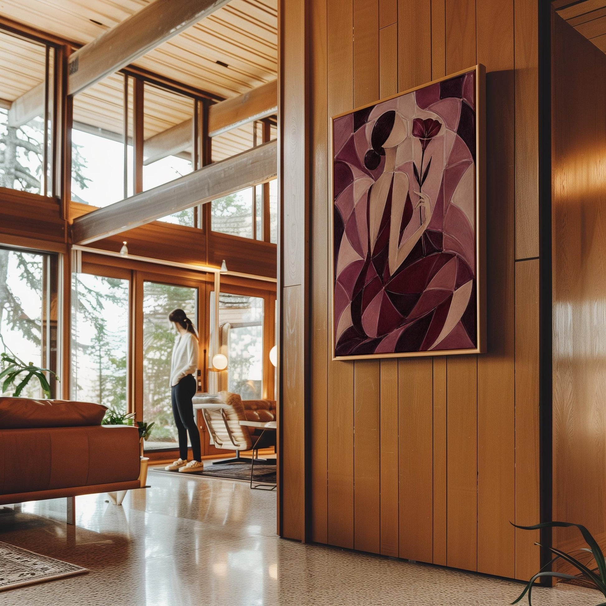 Woman holding poppies in cubist burgundy and cream, canvas print hanging in a calm, modern living space