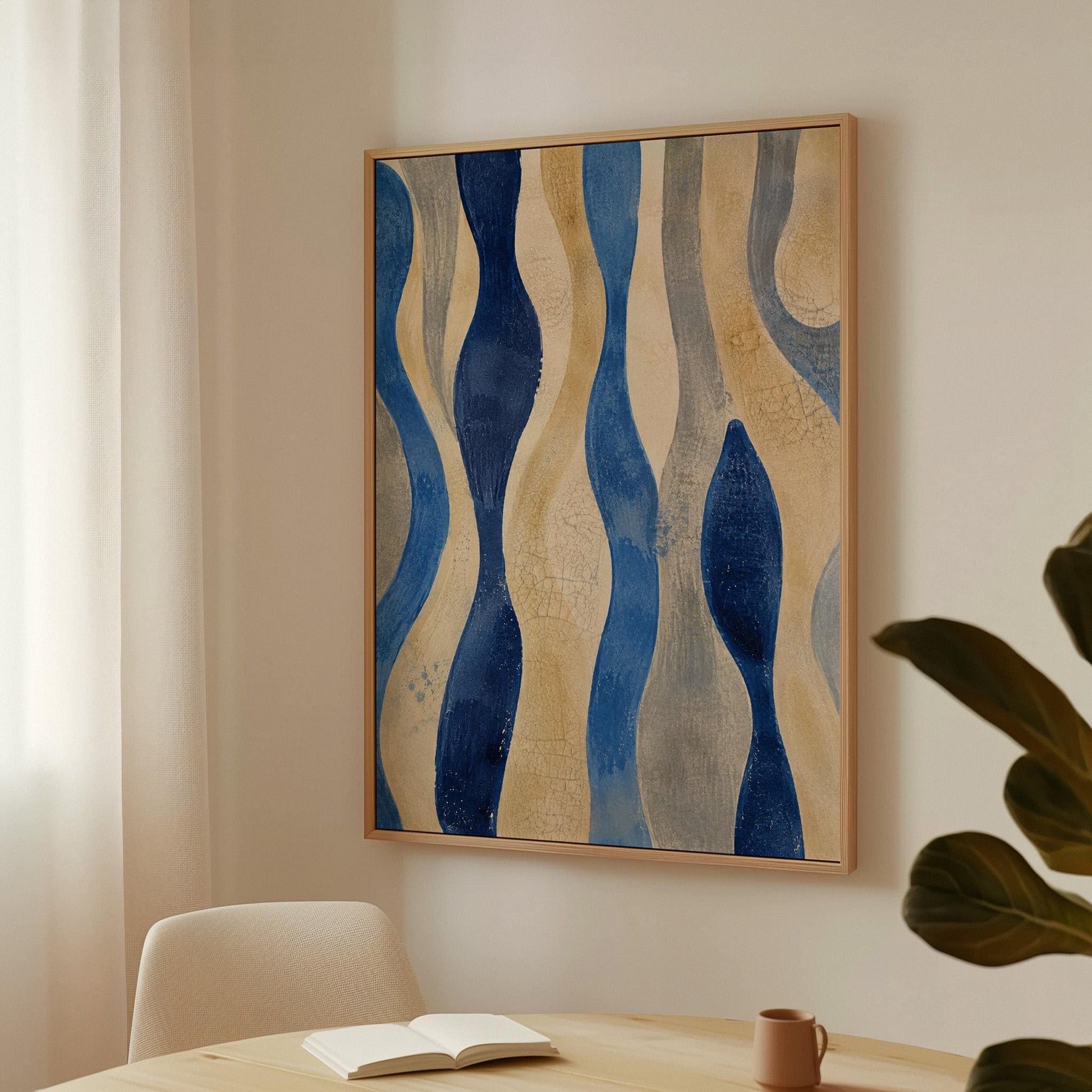 Vertical flowing wave bands in indigo and cream, canvas print shown in a sunlit, contemporary room