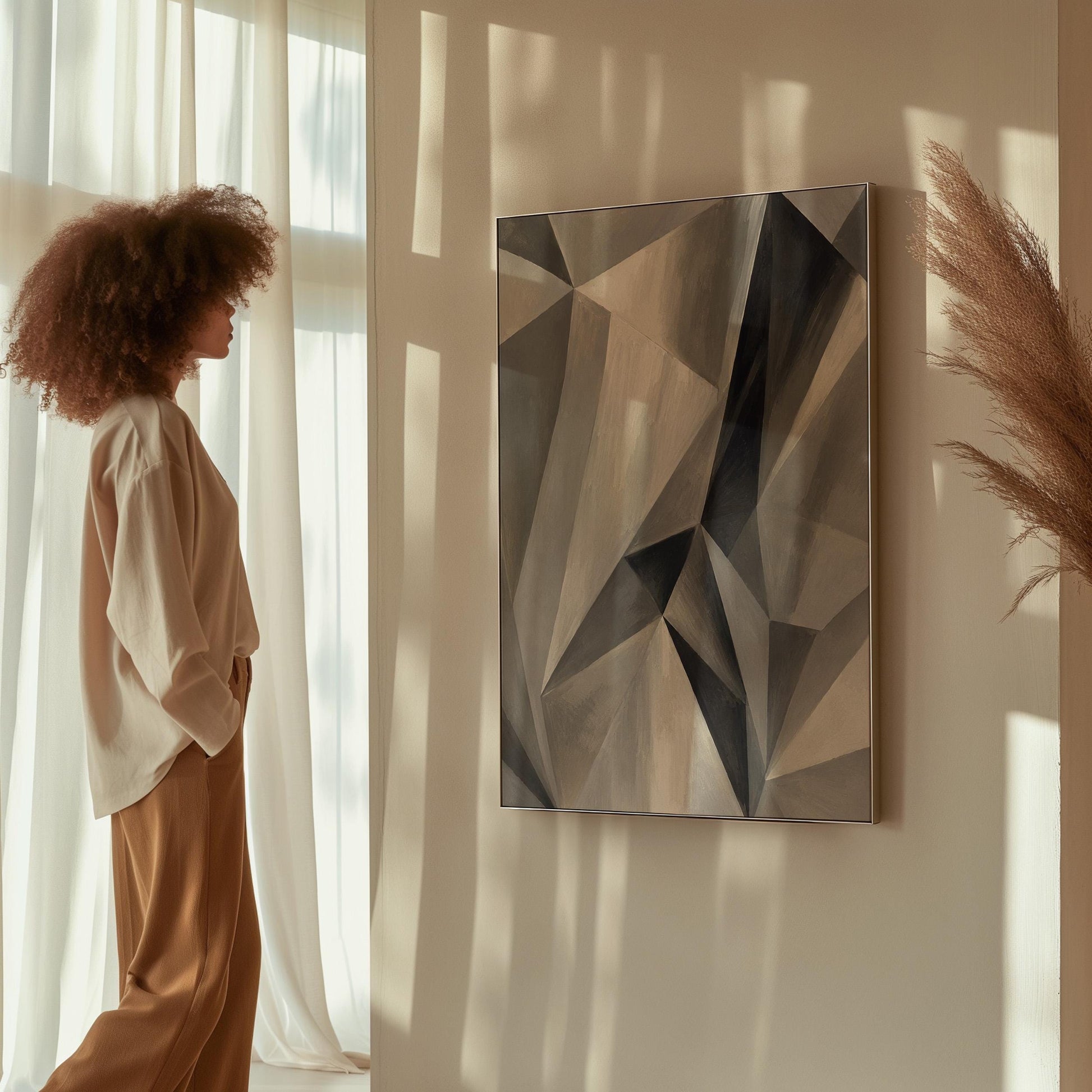 Angular graphite planes with sharp light play, canvas wall art seen in a warm interior with natural light