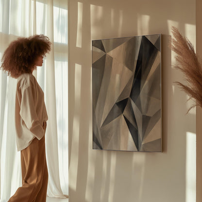 Angular graphite planes with sharp light play, canvas wall art seen in a warm interior with natural light
