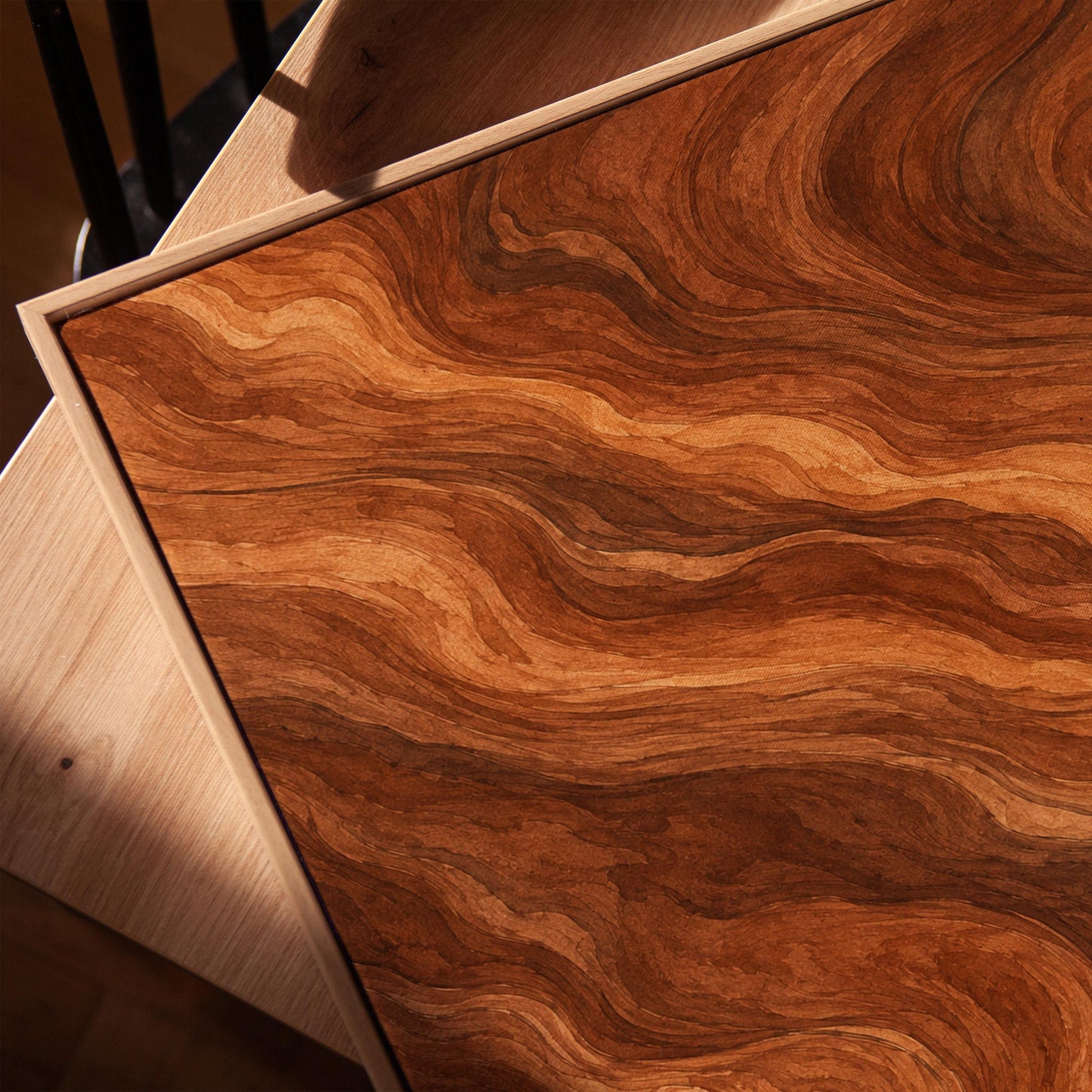Flowing copper and auburn swirl currents, canvas print in a warm, minimally styled interior
