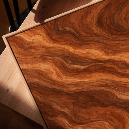 Flowing copper and auburn swirl currents, canvas print in a warm, minimally styled interior