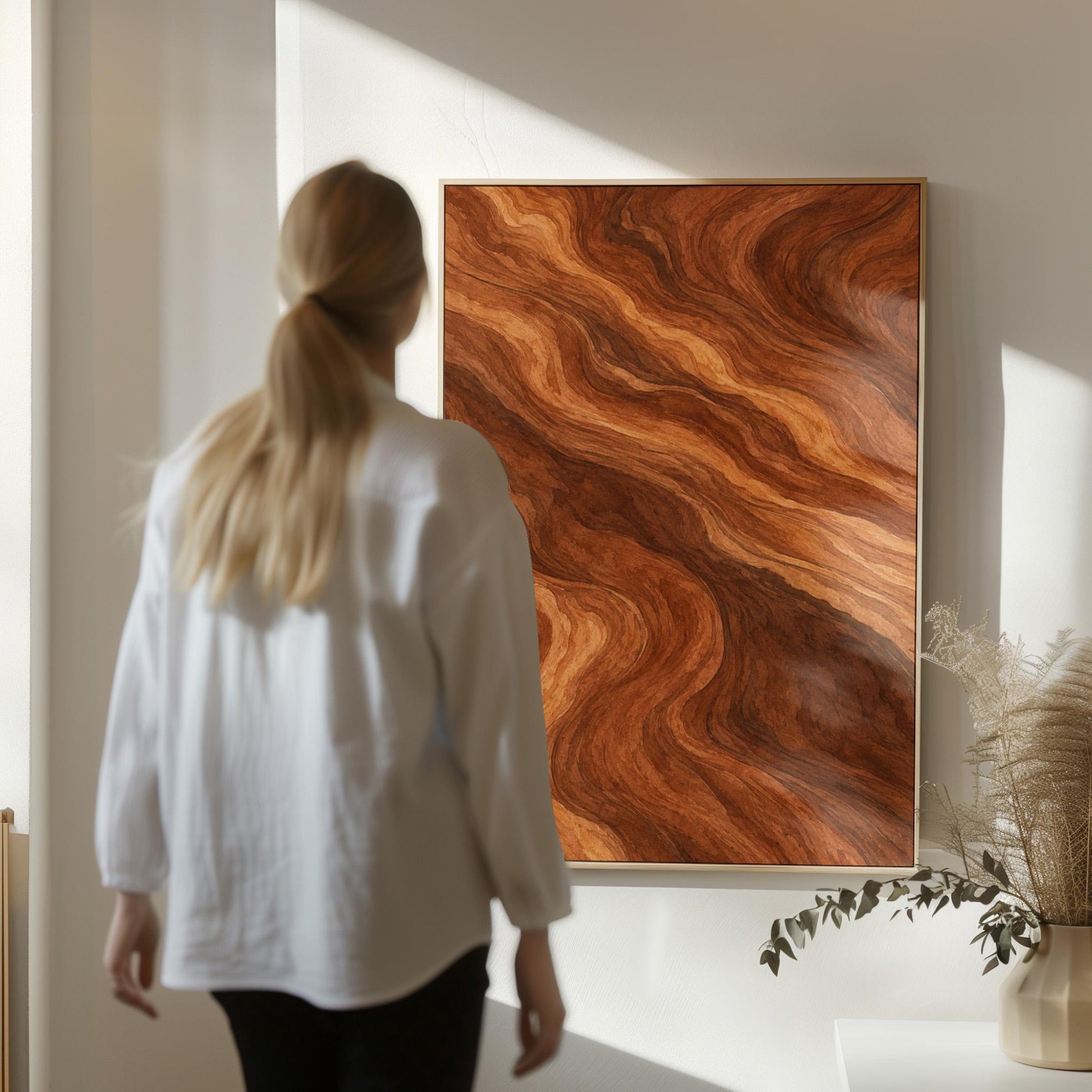 Flowing copper and auburn swirl currents, canvas print hanging in a calm, modern living space