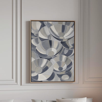 Nested silver bowl curves overlapping rhythmically, canvas print in a bright room with natural daylight