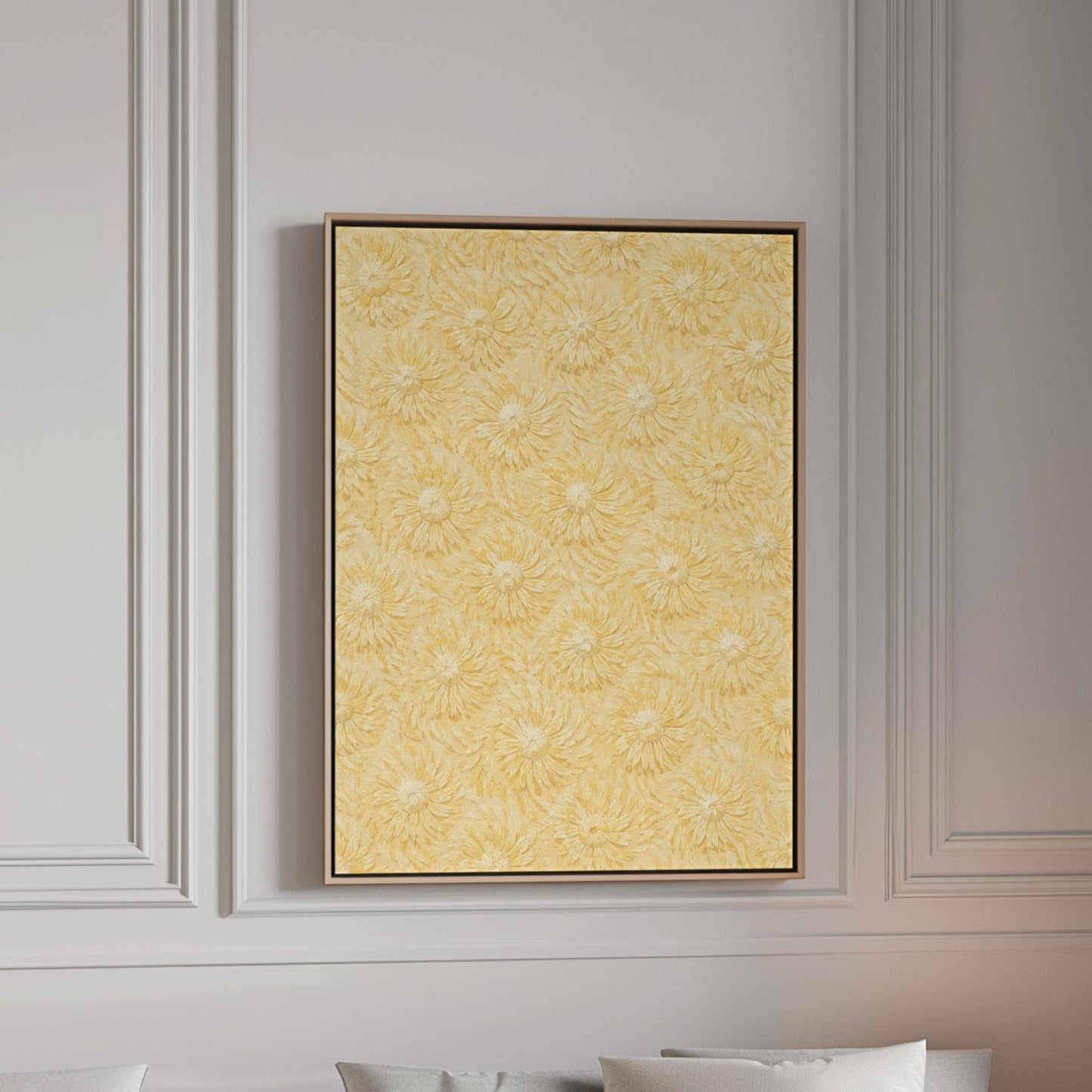 Field of soft butter yellow daisies pattern, canvas print in a bright room with natural daylight