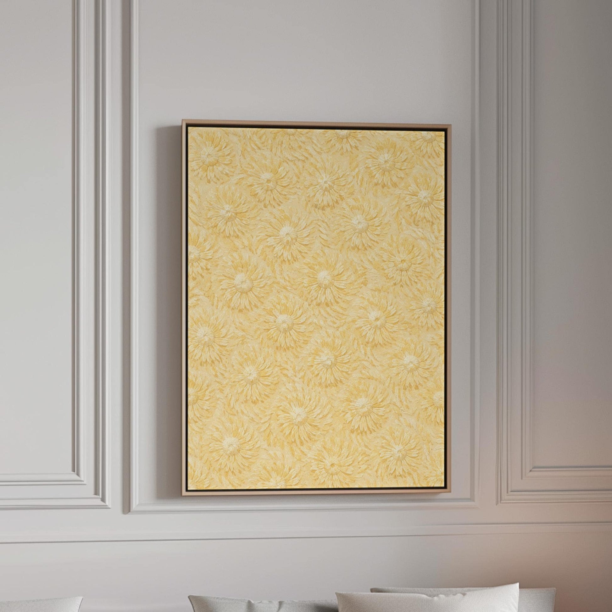 Field of soft butter yellow daisies pattern, canvas print in a bright room with natural daylight
