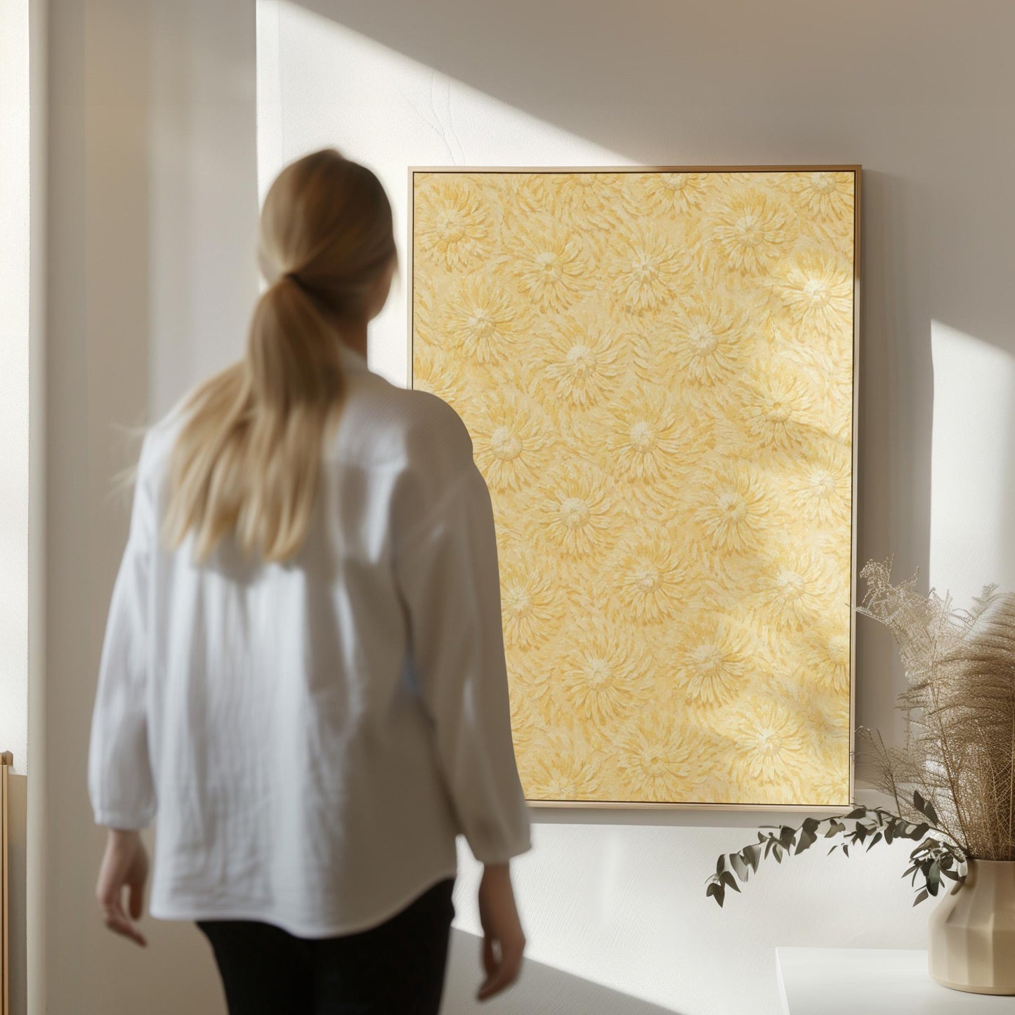 Field of soft butter yellow daisies pattern, canvas print on a quiet wall in a considered interior