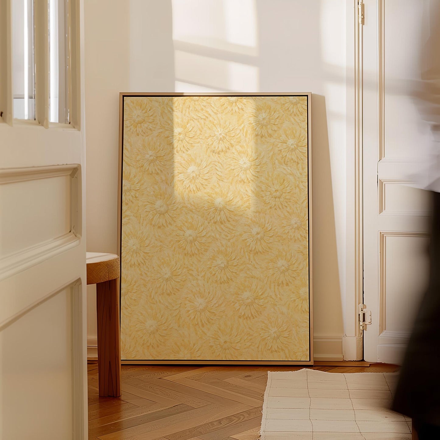 Field of soft butter yellow daisies pattern, canvas wall art on a quiet wall in a considered interior