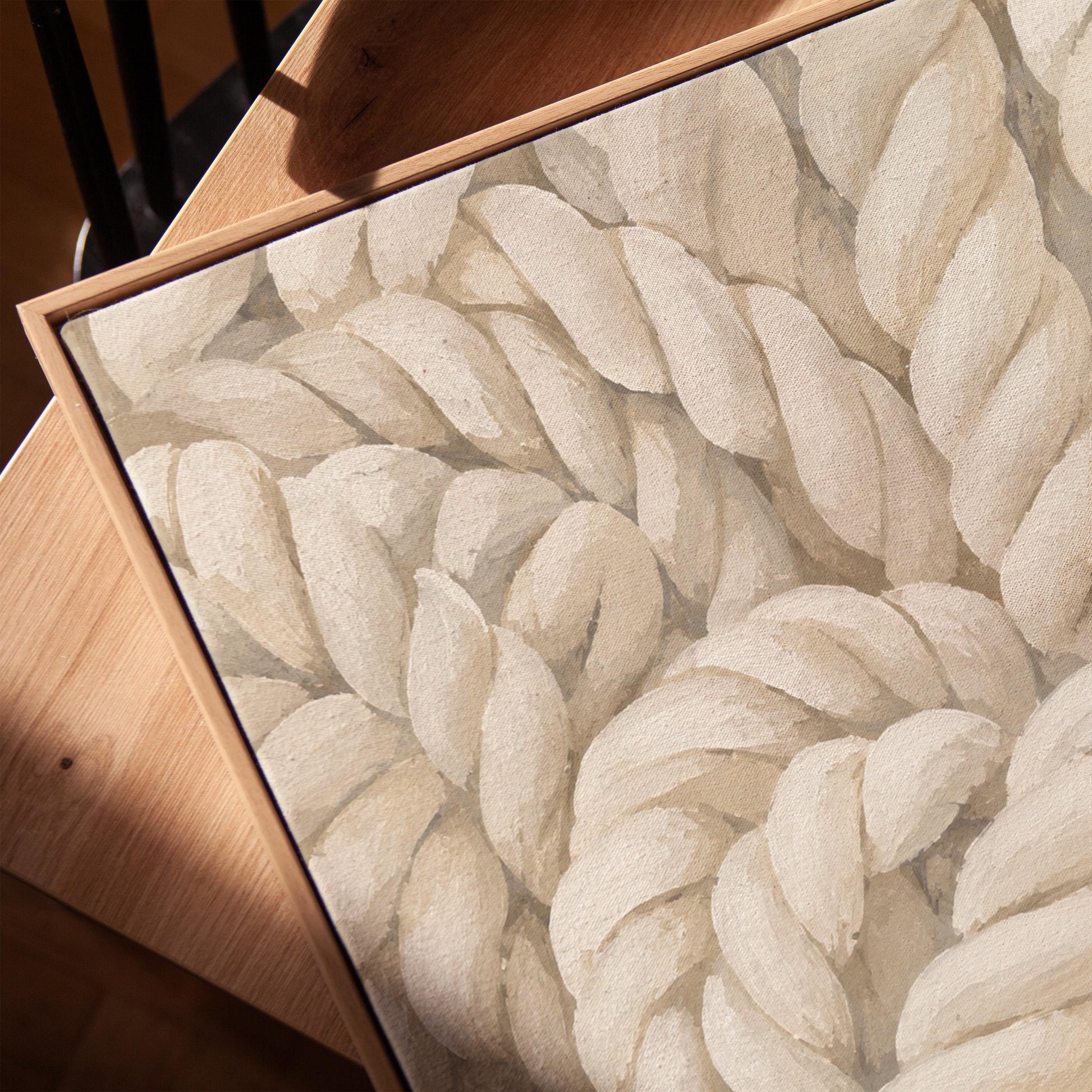 Thick cream ropes twisted into a knot, canvas print in a warm, minimally styled interior