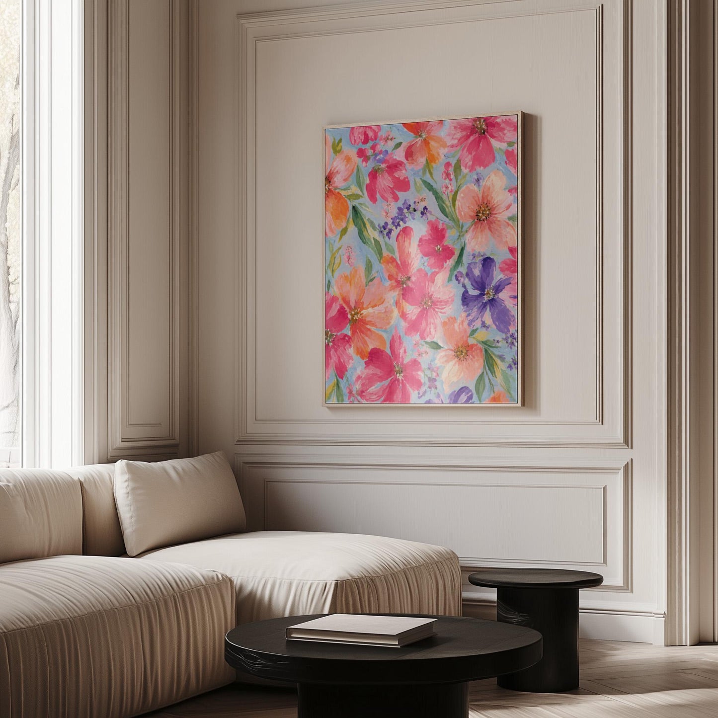 Vivid pink and purple watercolor blooms on light blue, canvas wall art on a quiet wall in a considered interior