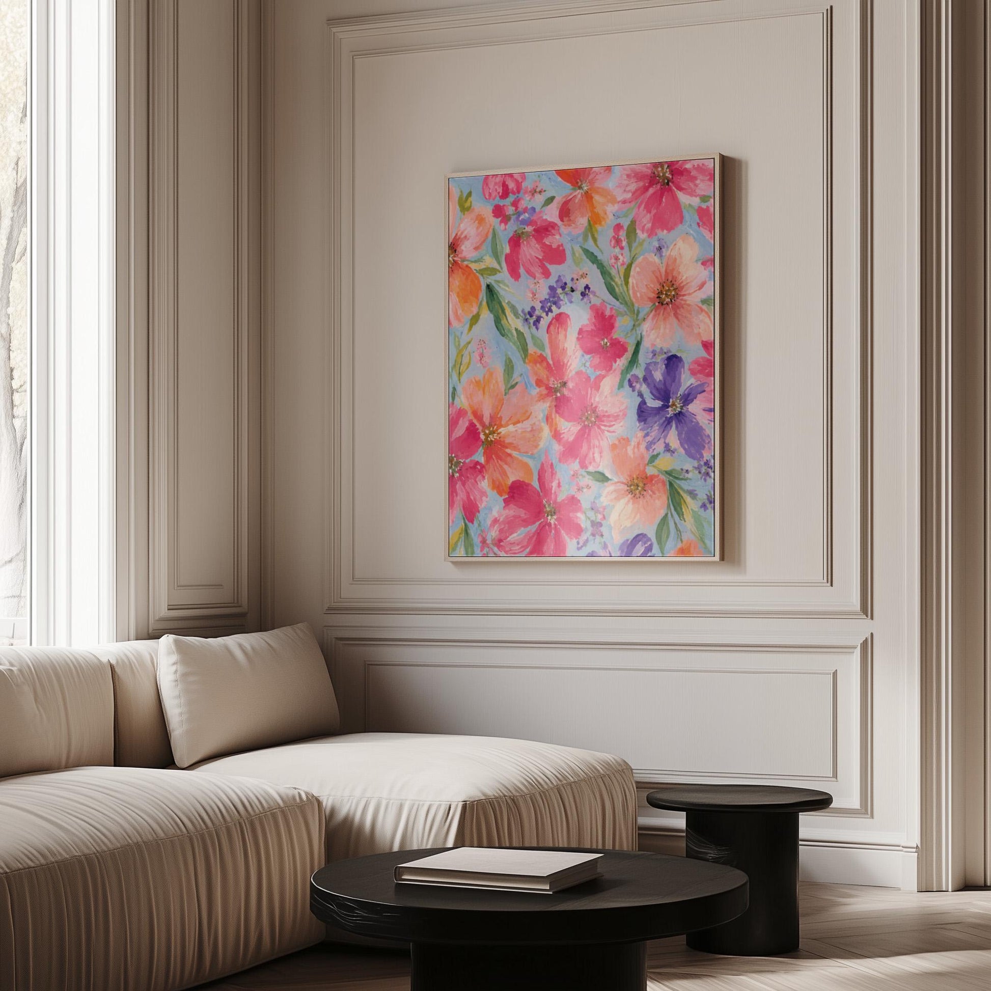 Vivid pink and purple watercolor blooms on light blue, canvas wall art on a quiet wall in a considered interior