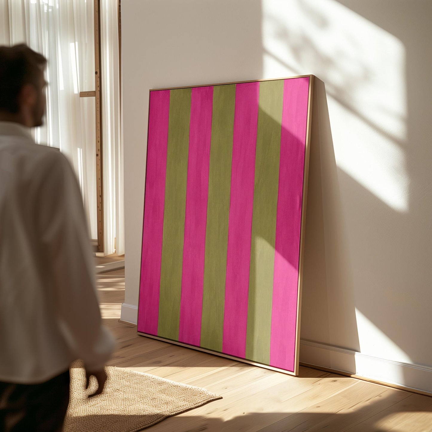 Bold vertical stripes in hot pink and olive green, canvas print presented in a light, minimal room