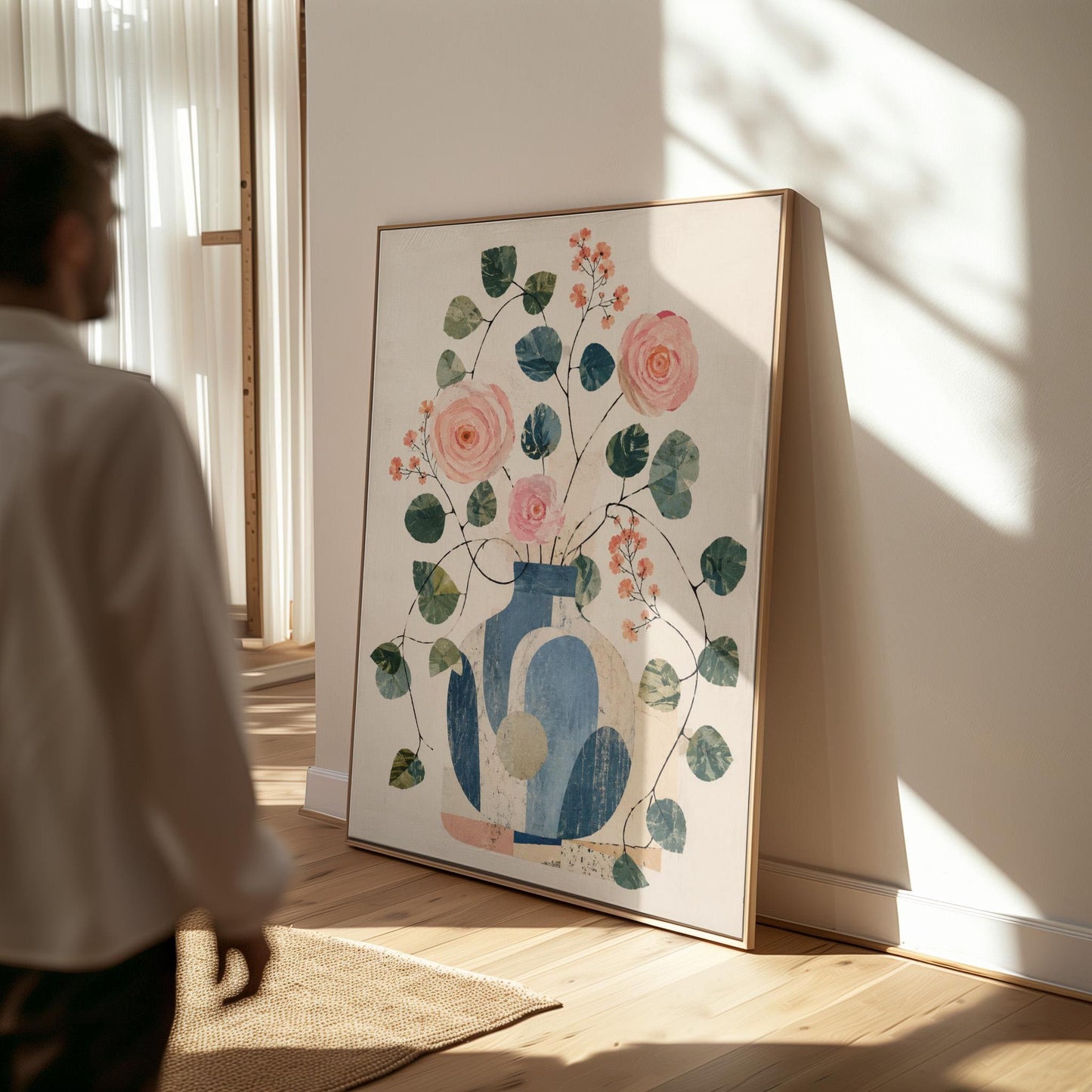 Roses and sprigs in two blue collage vases, canvas print hanging in a calm, modern living space
