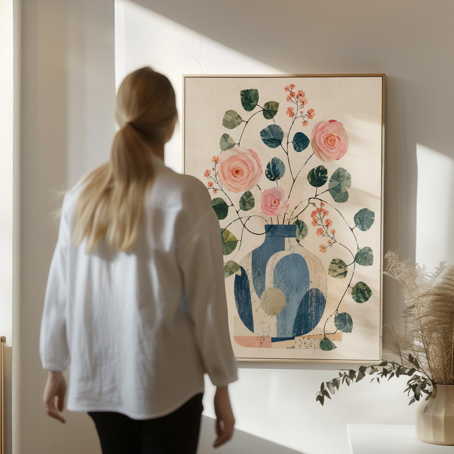 Roses and sprigs in two blue collage vases, canvas print styled against a soft white wall