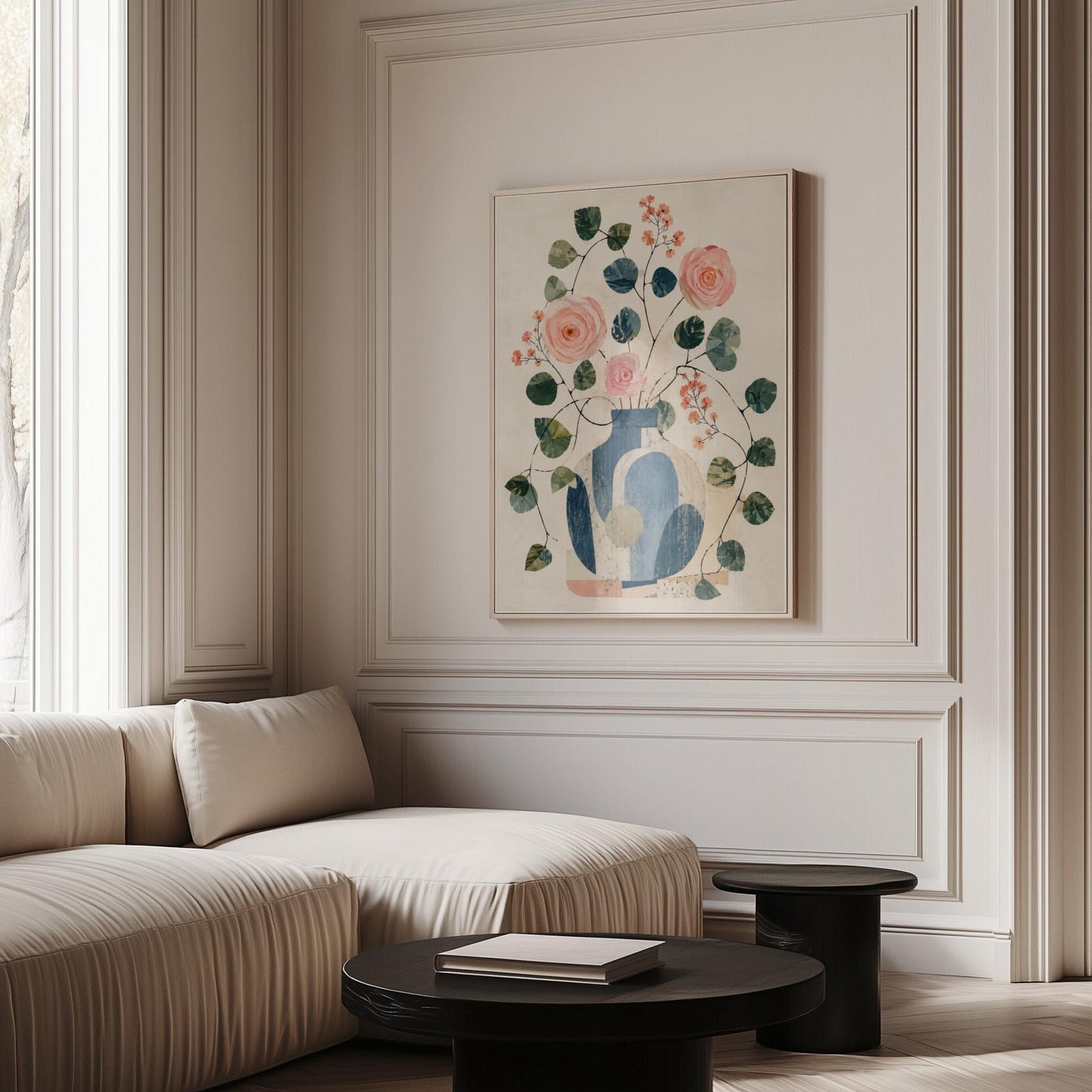 Roses and sprigs in two blue collage vases, canvas wall art hanging in a calm, modern living space
