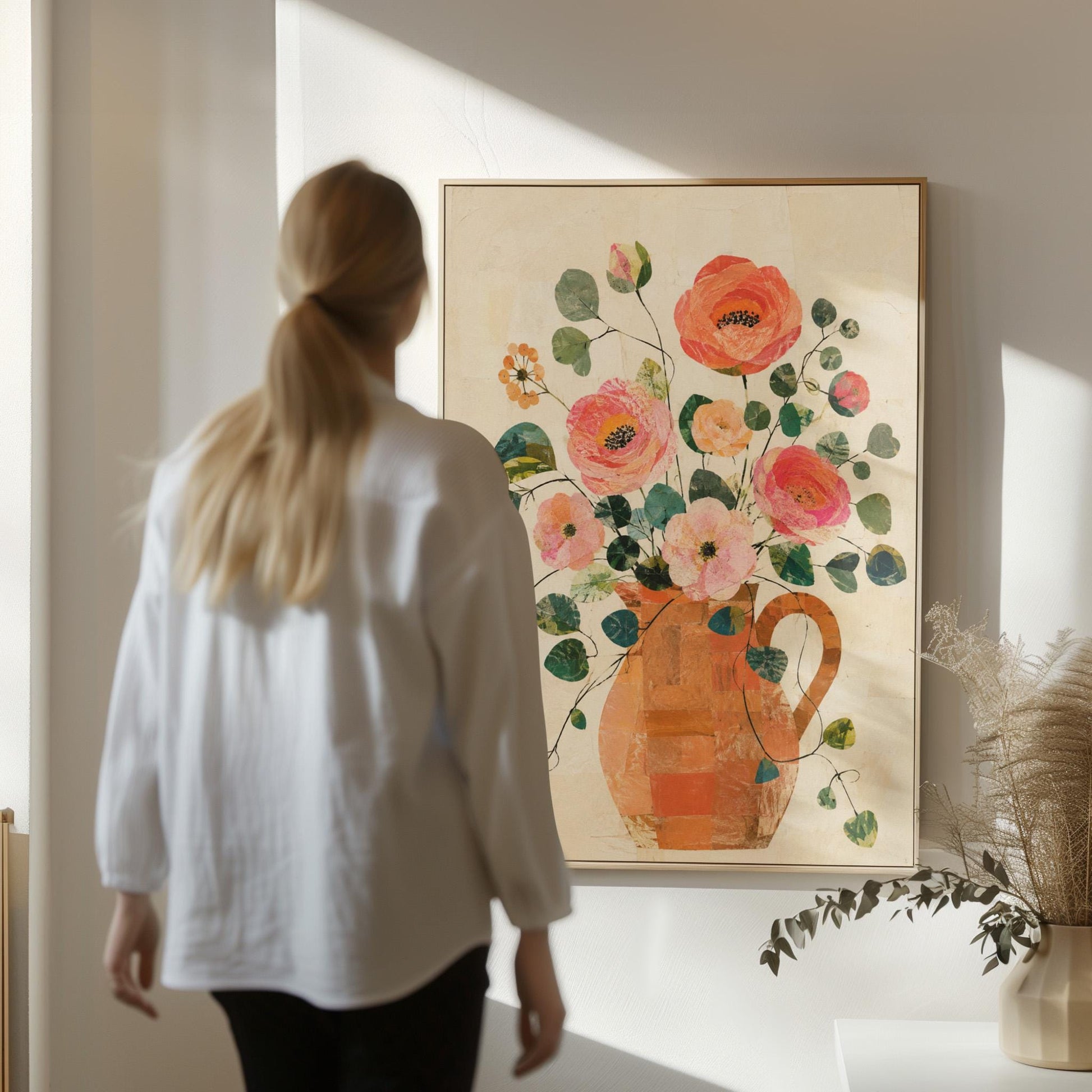 Coral poppies and blooms in a clay jug, canvas wall art seen in a warm interior with natural light