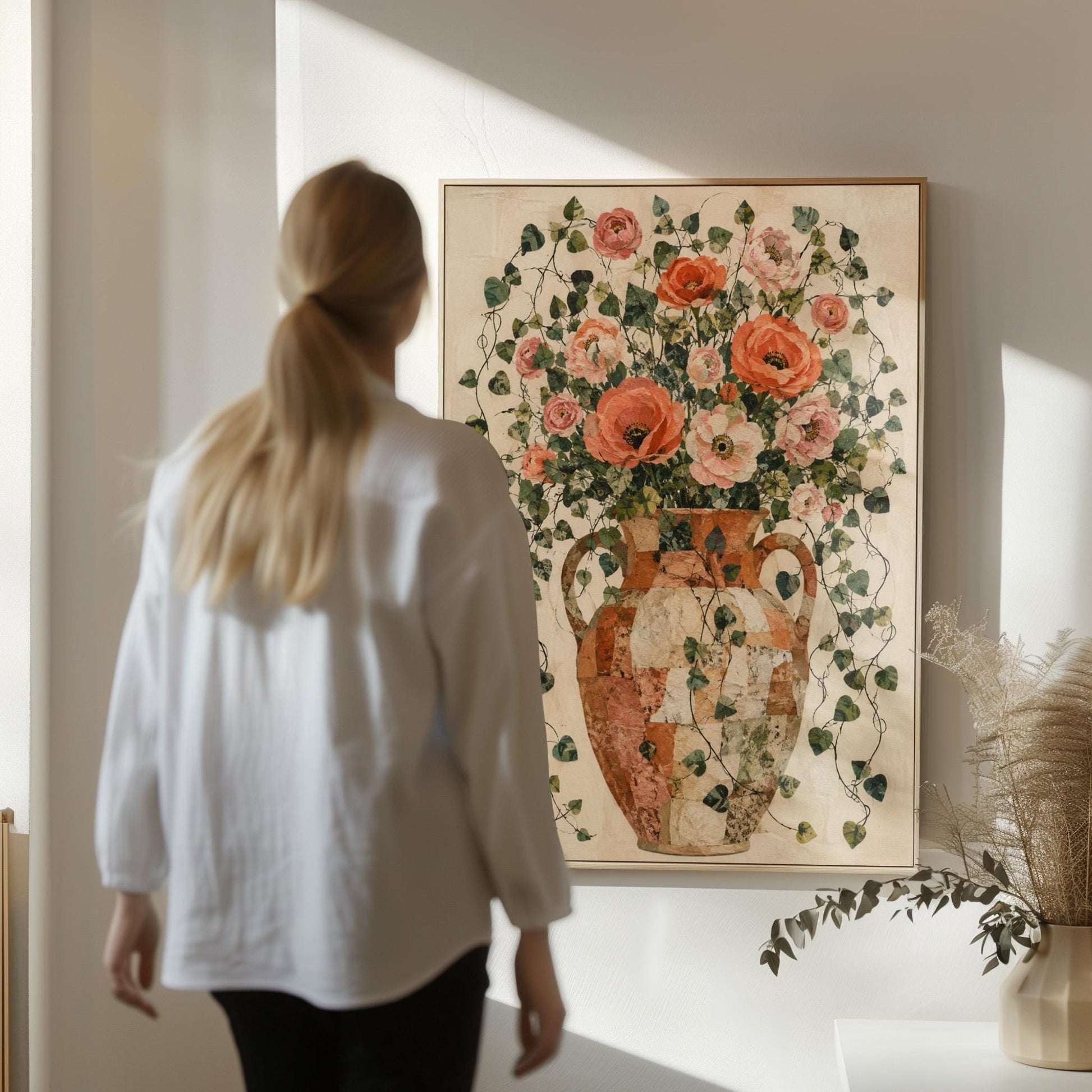 Peach roses overflowing from antique amphora, canvas print presented in a light, minimal room