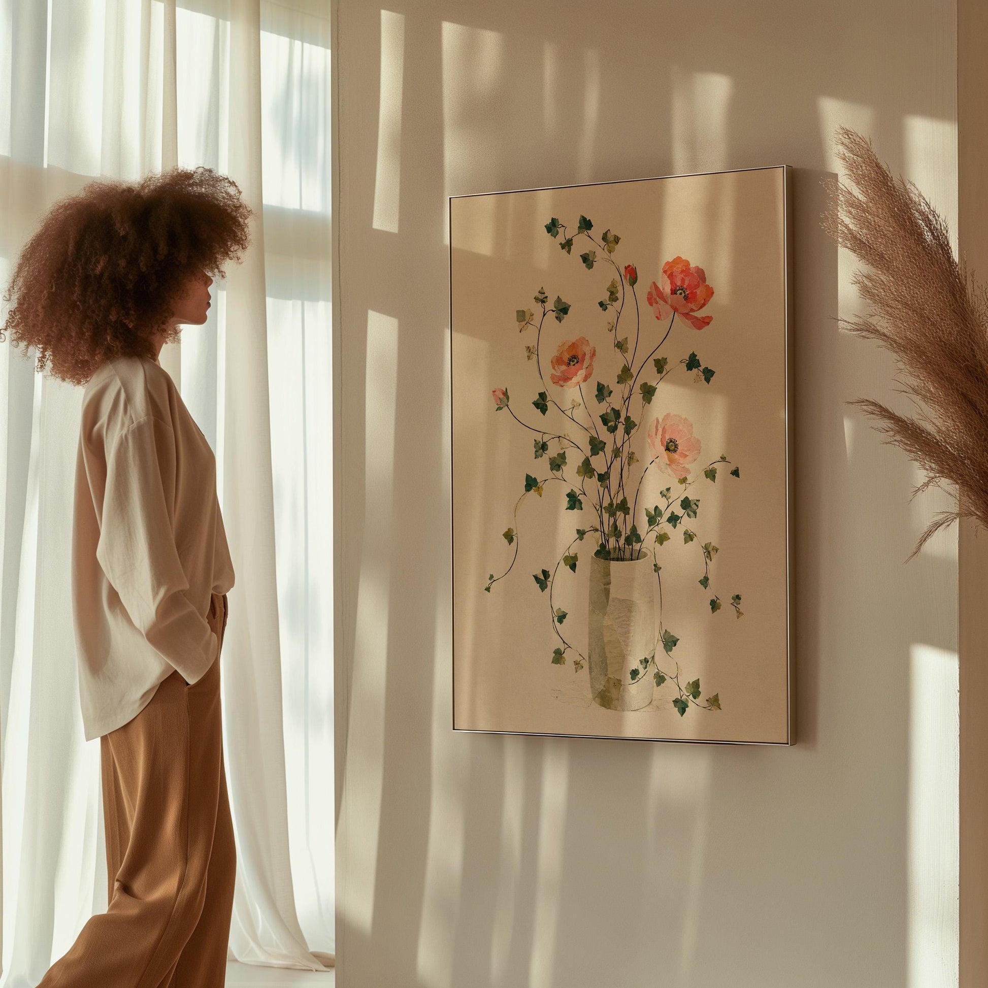 Coral poppies with ivy stems in slender vase, canvas wall art presented in a light, minimal room